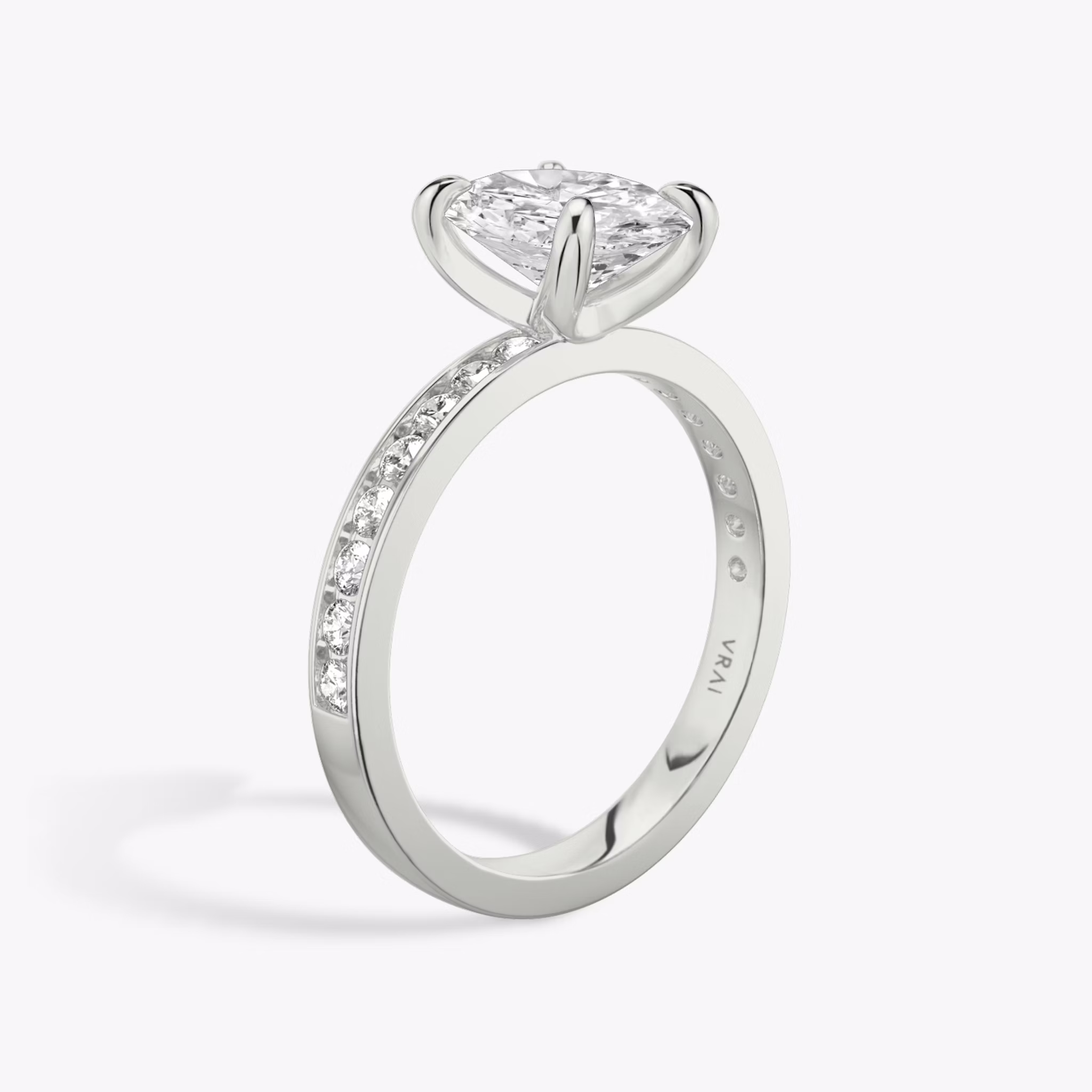 The Devotion | Oval | 18k | White Gold | bandAccent: Pavé | bandStoneShape: Round Brilliant | bandStoneStyle: large | diamondOrientation: vertical | caratWeight: other