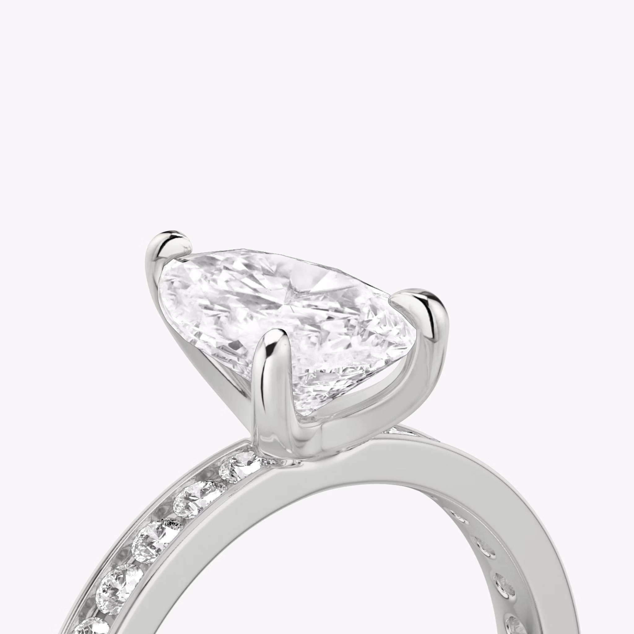 The Devotion | Pear | 18k | White Gold | bandAccent: Pavé | bandStoneShape: Round Brilliant | bandStoneStyle: large | diamondOrientation: vertical | caratWeight: other