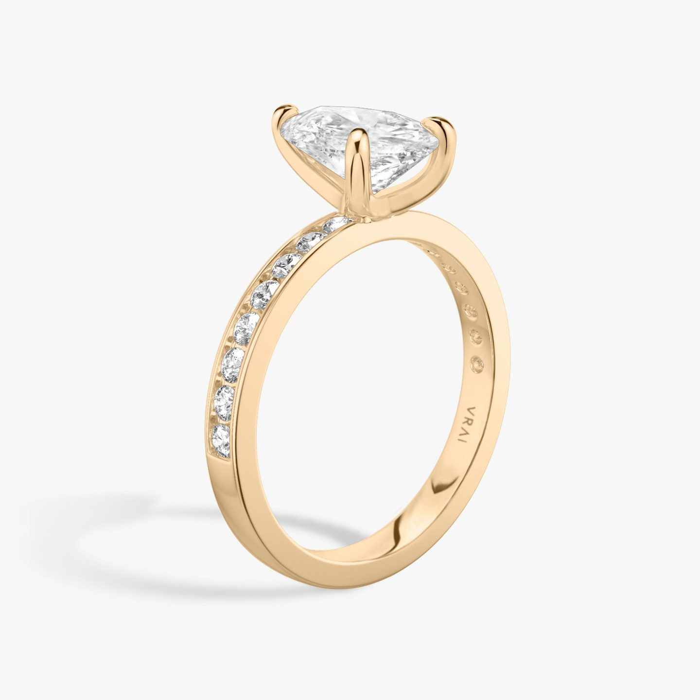 The Devotion | Pear | 14k | Rose Gold | bandAccent: Pavé | bandStoneShape: Round Brilliant | bandStoneStyle: large | diamondOrientation: vertical | caratWeight: other