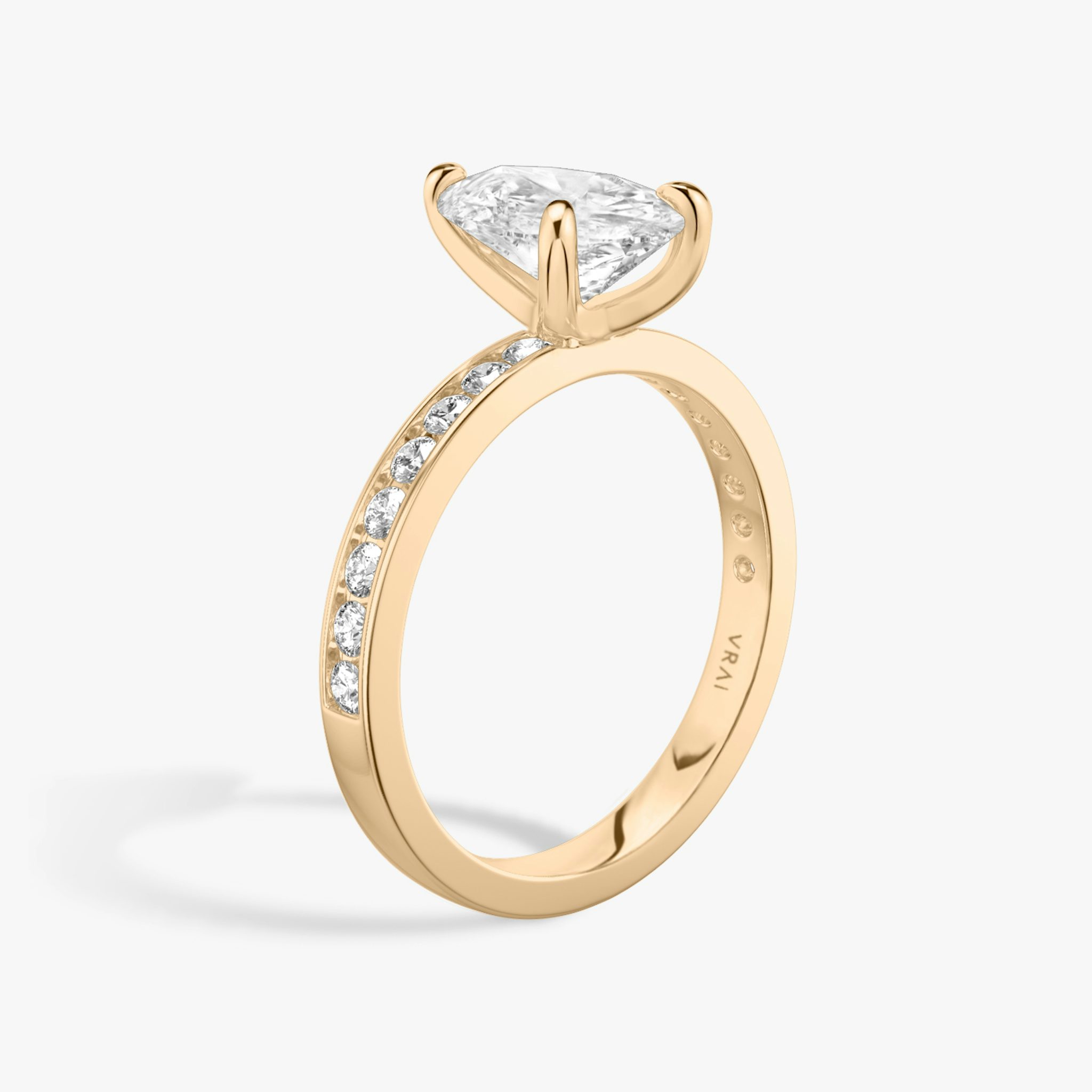 The Devotion | Pear | 14k | Rose Gold | bandAccent: Pavé | bandStoneShape: Round Brilliant | bandStoneStyle: large | diamondOrientation: vertical | caratWeight: other