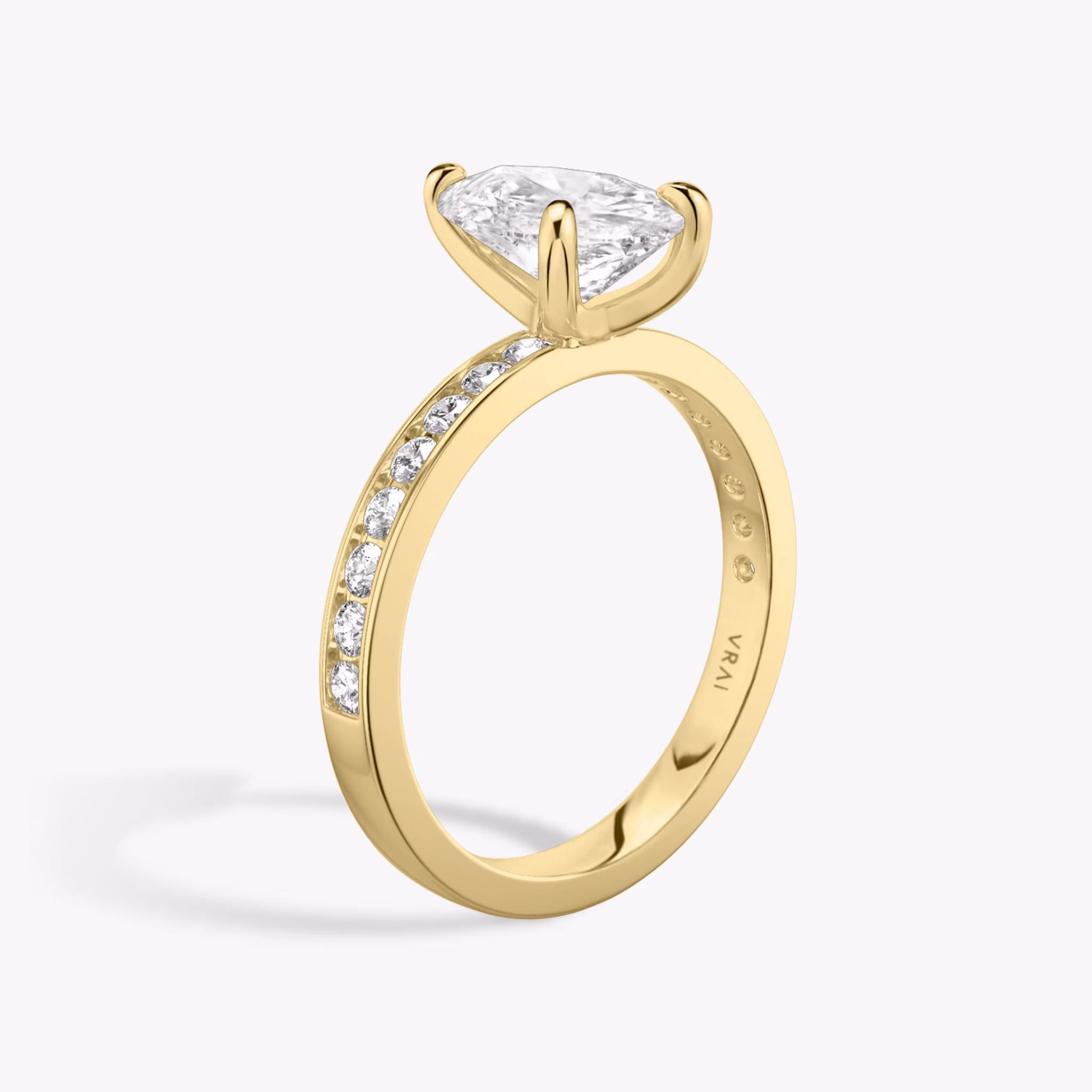 The Devotion | Pear | 18k | Yellow Gold | bandAccent: Pavé | bandStoneShape: Round Brilliant | bandStoneStyle: large | diamondOrientation: vertical | caratWeight: other