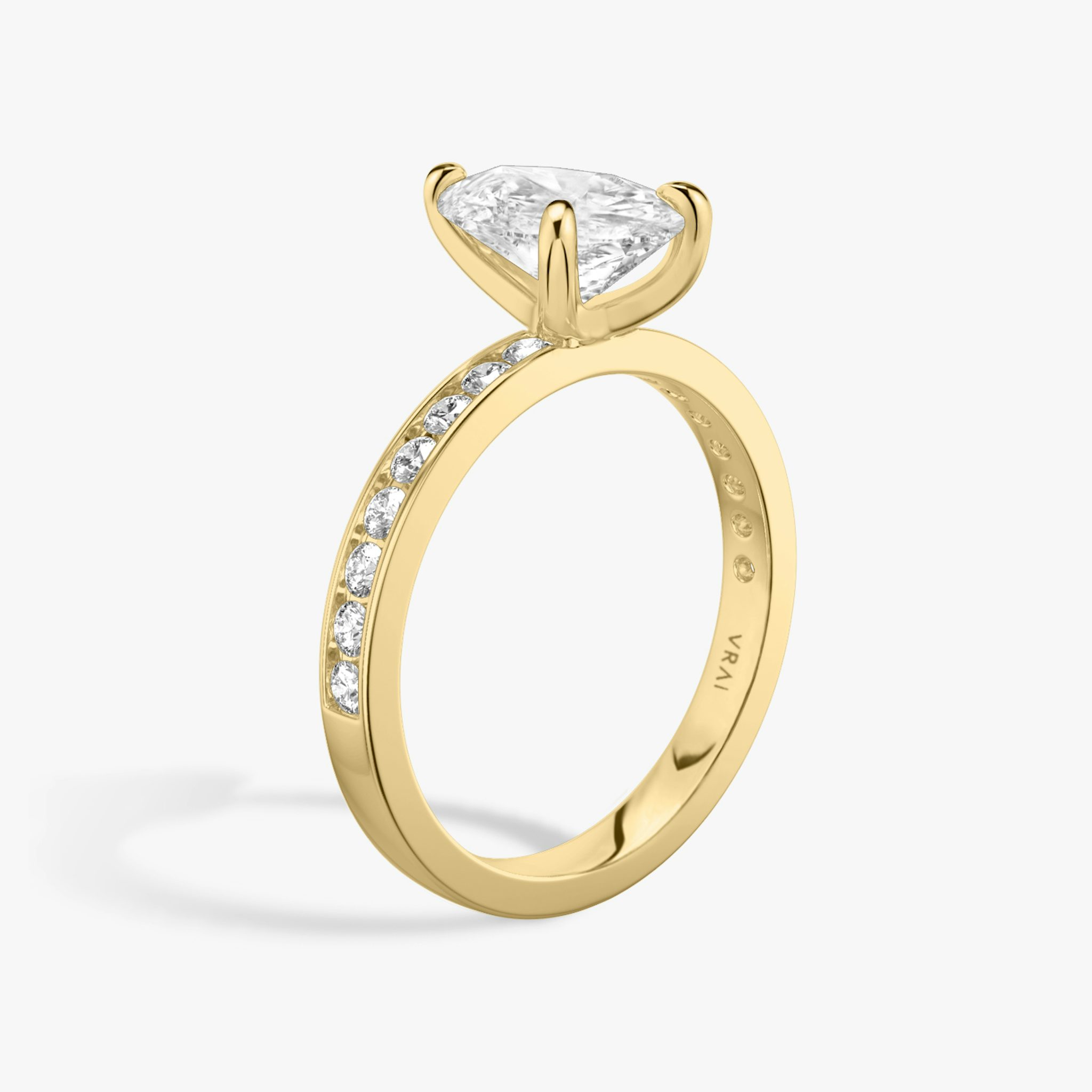 The Devotion | Pear | 18k | Yellow Gold | bandAccent: Pavé | bandStoneShape: Round Brilliant | bandStoneStyle: large | diamondOrientation: vertical | caratWeight: other