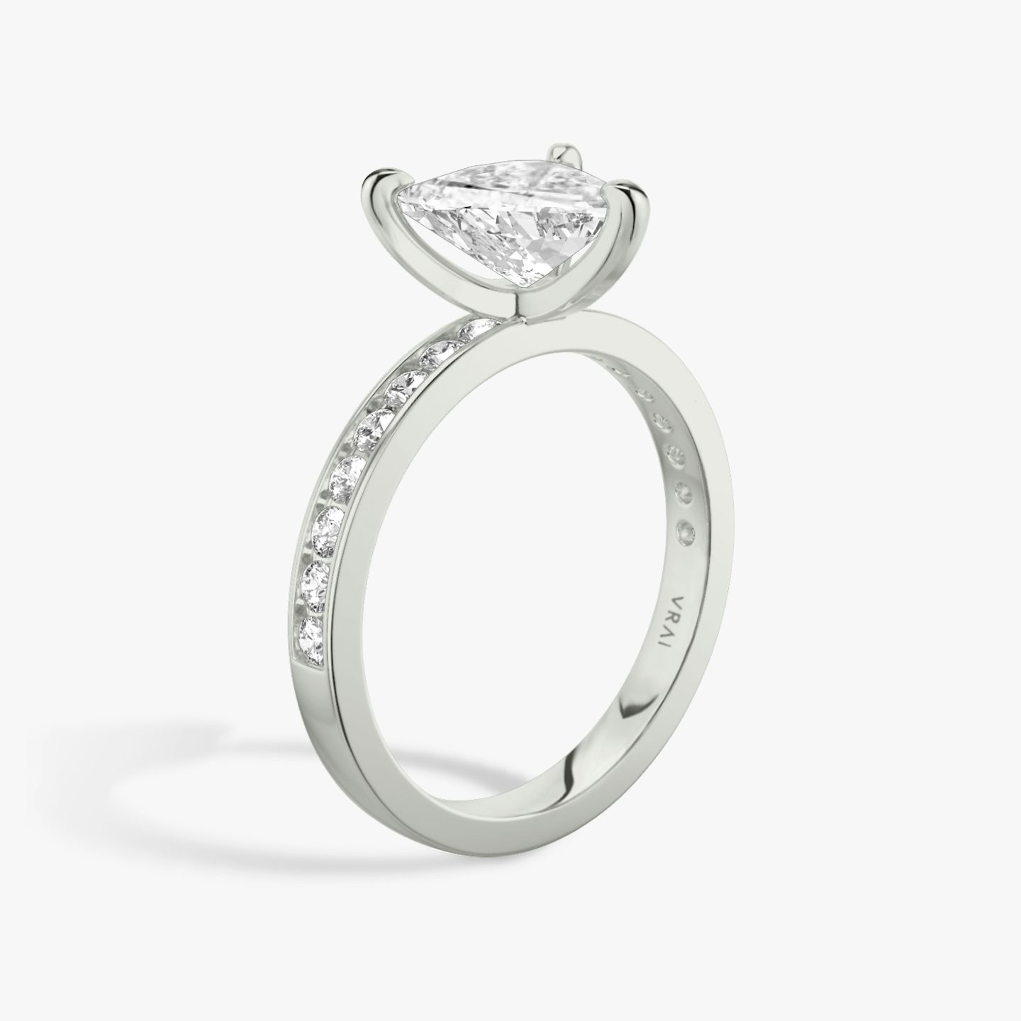 The Devotion | Trillion | Platinum | bandAccent: Pavé | bandStoneShape: Round Brilliant | bandStoneStyle: large | diamondOrientation: vertical | caratWeight: other