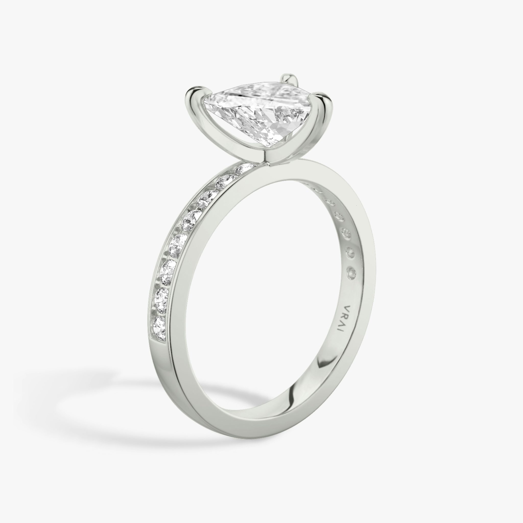 The Devotion | Trillion | 18k | White Gold | bandAccent: Pavé | bandStoneShape: Round Brilliant | bandStoneStyle: large | diamondOrientation: vertical | caratWeight: other