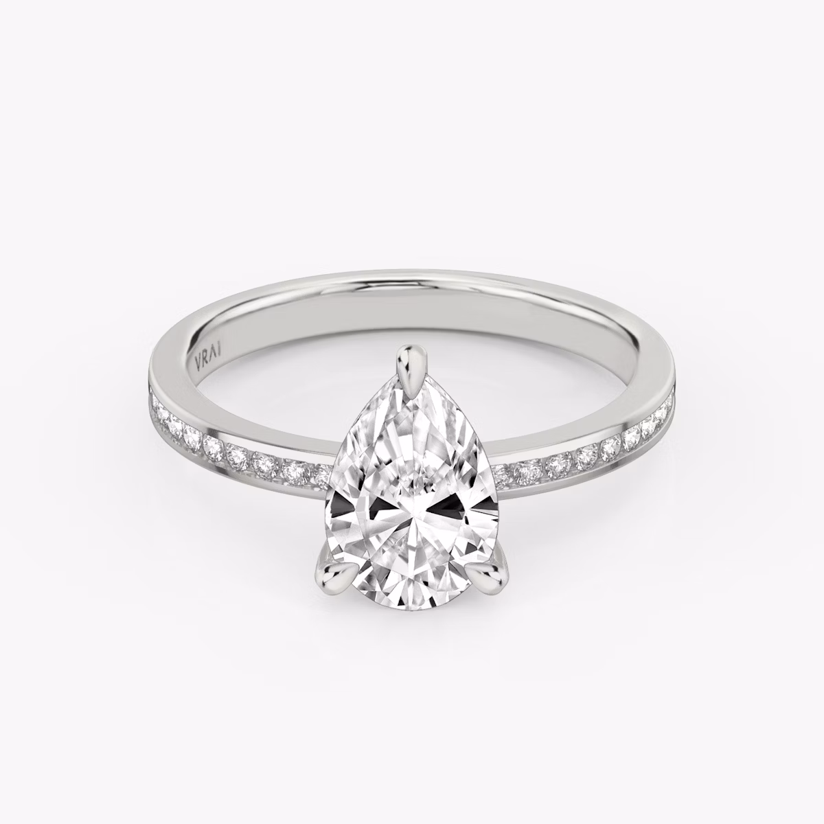 The Devotion | Pear | 18k | White Gold | bandAccent: Pavé | bandStoneShape: Round Brilliant | bandStoneStyle: original | diamondOrientation: vertical | caratWeight: other