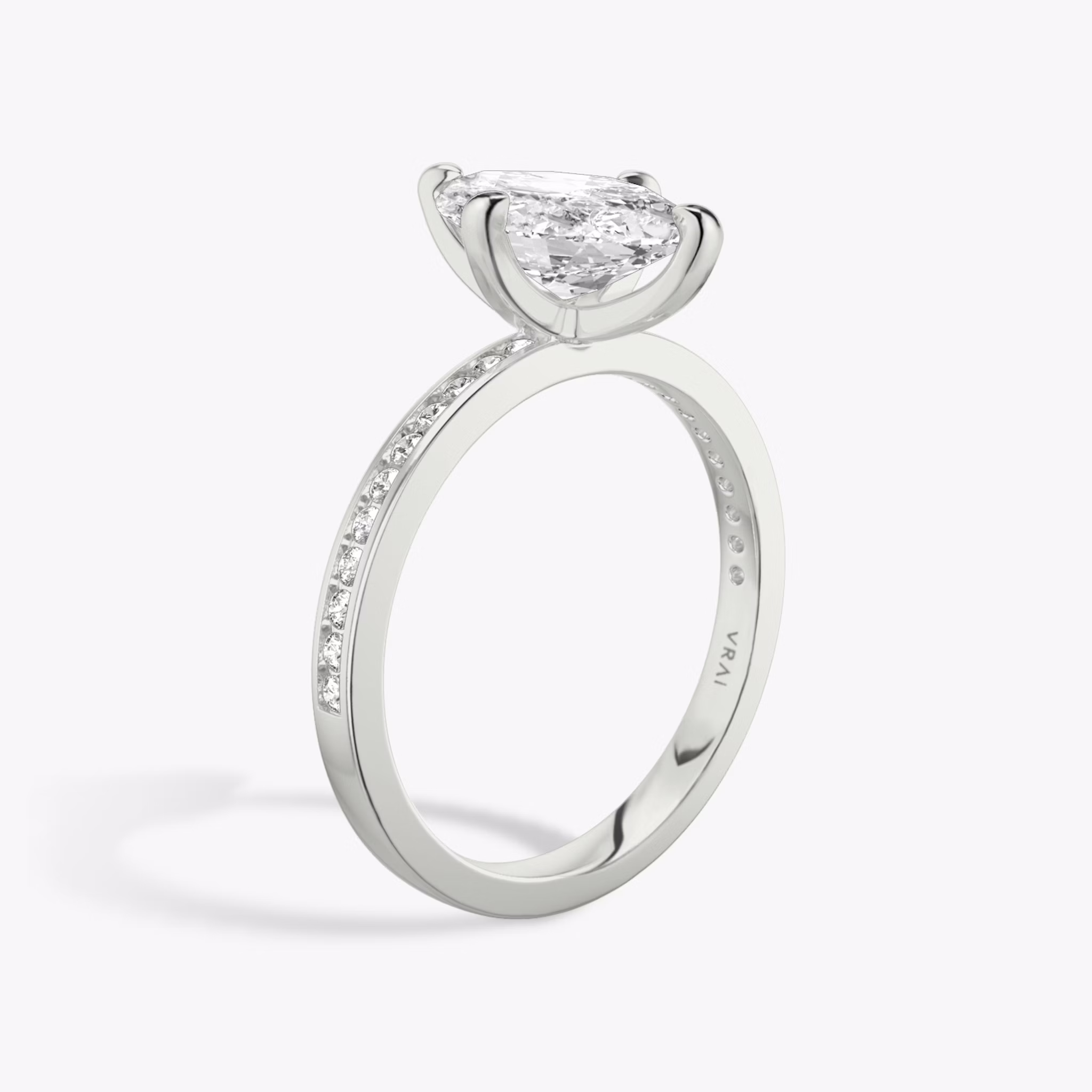 The Devotion | Marquise | Platinum | bandAccent: Pavé | bandStoneShape: Round Brilliant | bandStoneStyle: original | diamondOrientation: vertical | caratWeight: other