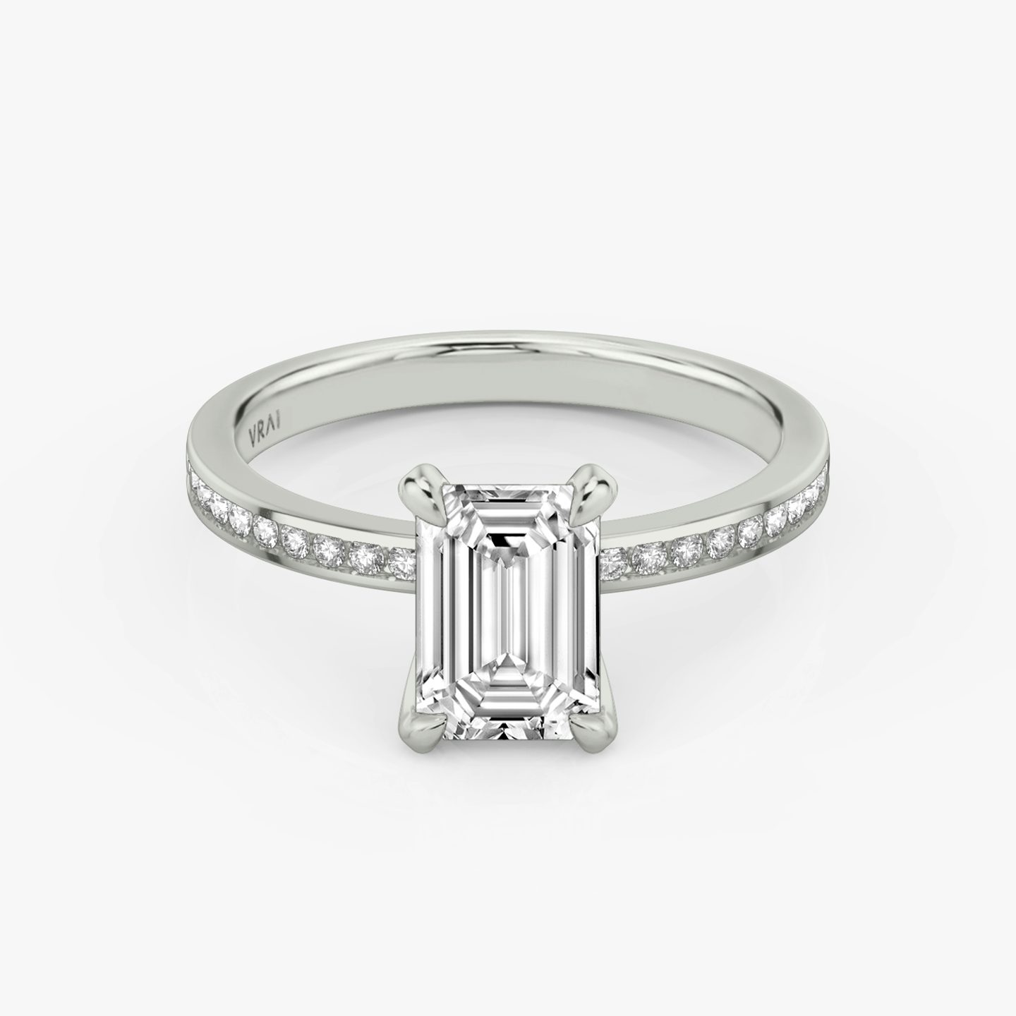 The Devotion | Emerald | Platinum | bandAccent: Pavé | bandStoneShape: Round Brilliant | bandStoneStyle: original | diamondOrientation: vertical | caratWeight: other