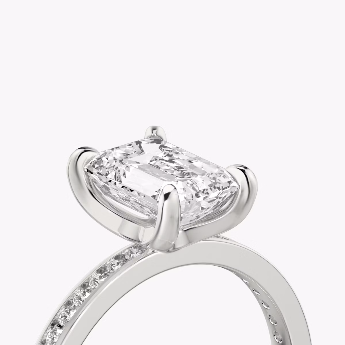 The Devotion | Emerald | 18k | White Gold | bandAccent: Pavé | bandStoneShape: Round Brilliant | bandStoneStyle: original | diamondOrientation: vertical | caratWeight: other