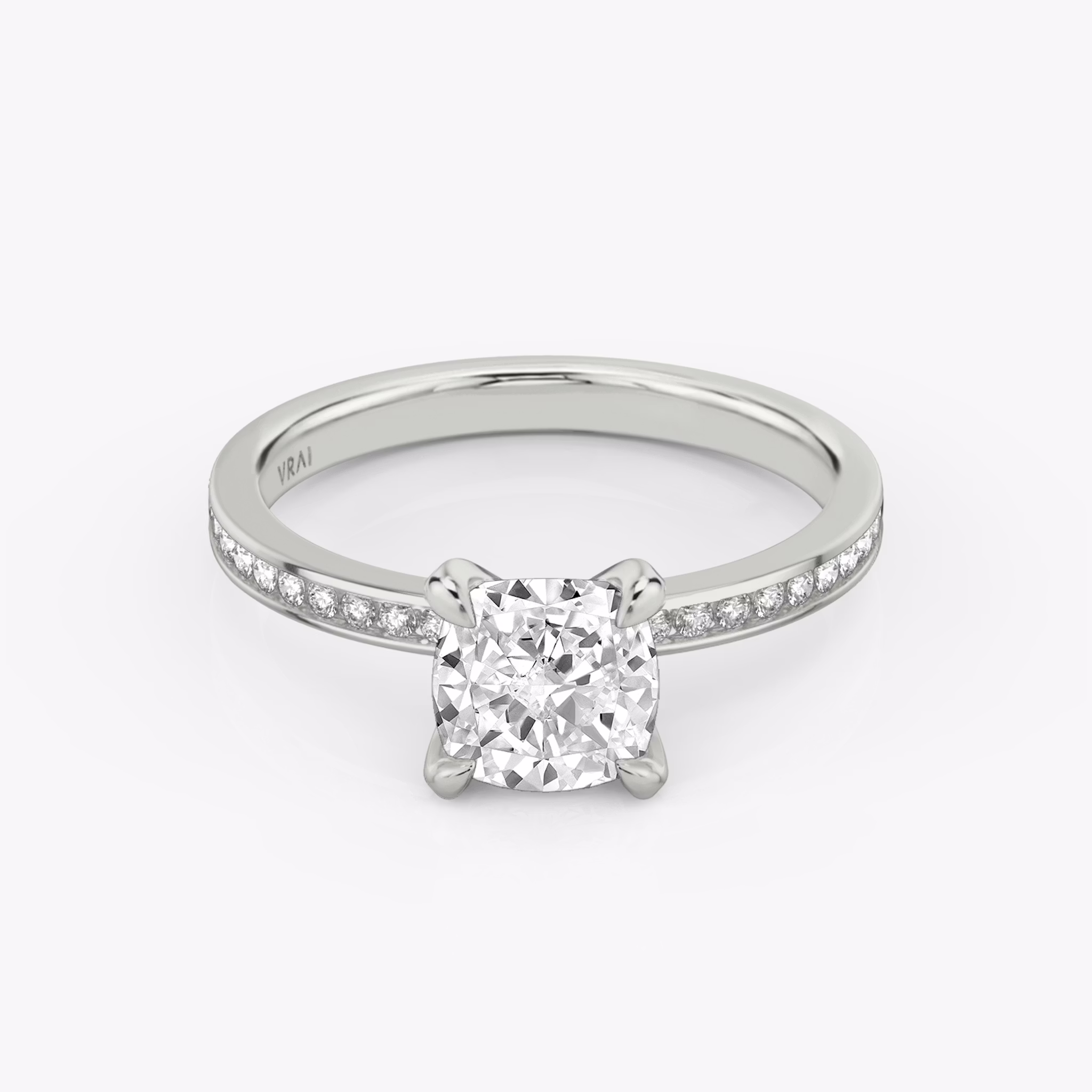 The Devotion | Cushion | 18k | White Gold | bandAccent: Pavé | bandStoneShape: Round Brilliant | bandStoneStyle: original | diamondOrientation: vertical | caratWeight: other