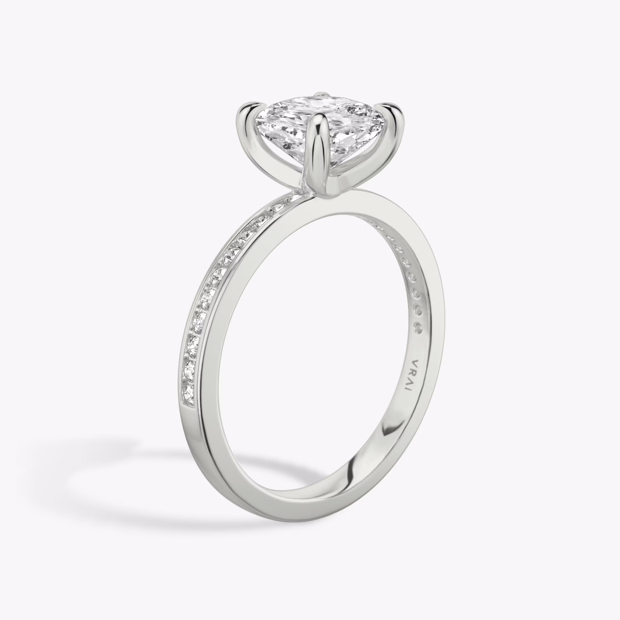 The Devotion | Cushion | 18k | White Gold | bandAccent: Pavé | bandStoneShape: Round Brilliant | bandStoneStyle: original | diamondOrientation: vertical | caratWeight: other