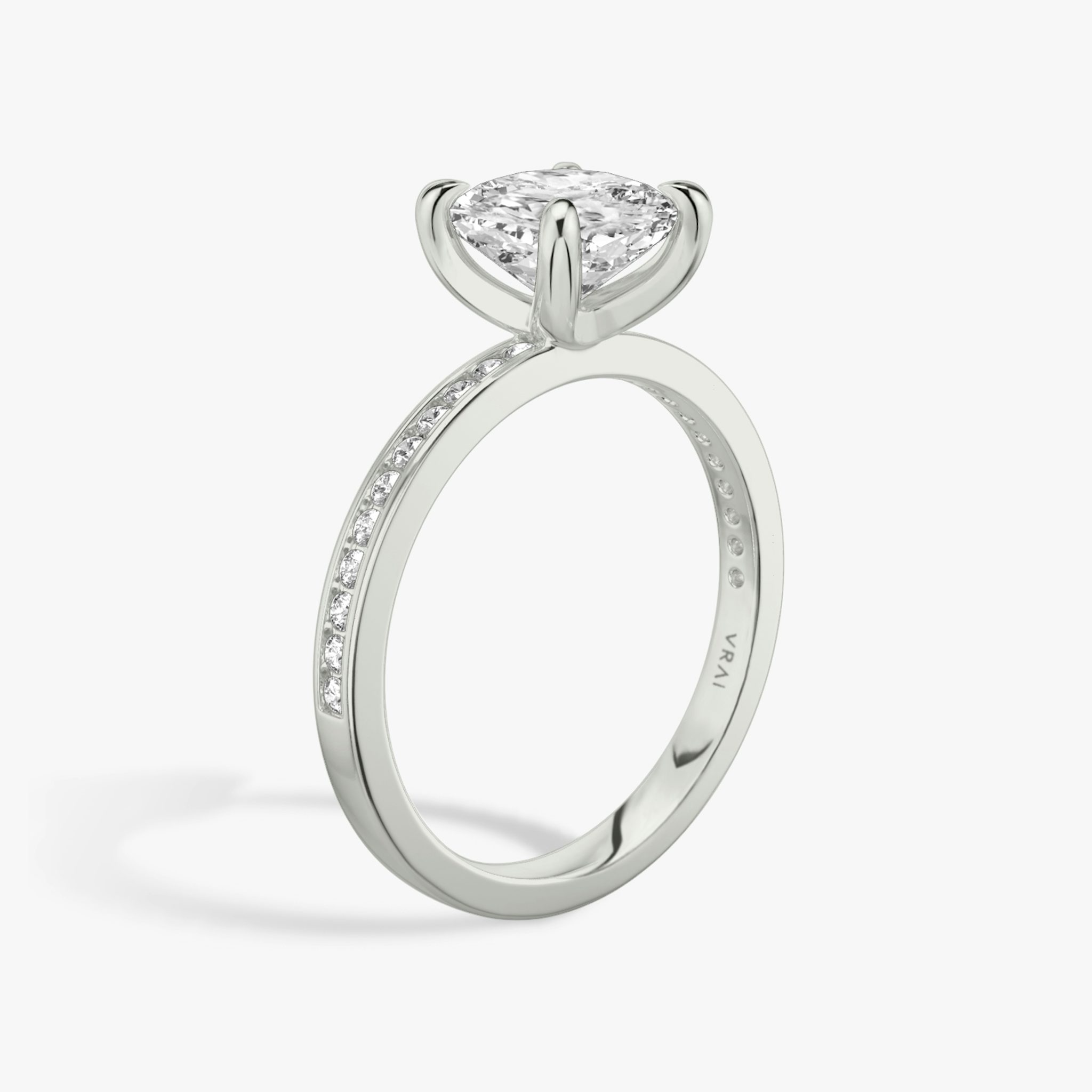 The Devotion | Cushion | 18k | White Gold | bandAccent: Pavé | bandStoneShape: Round Brilliant | bandStoneStyle: original | diamondOrientation: vertical | caratWeight: other