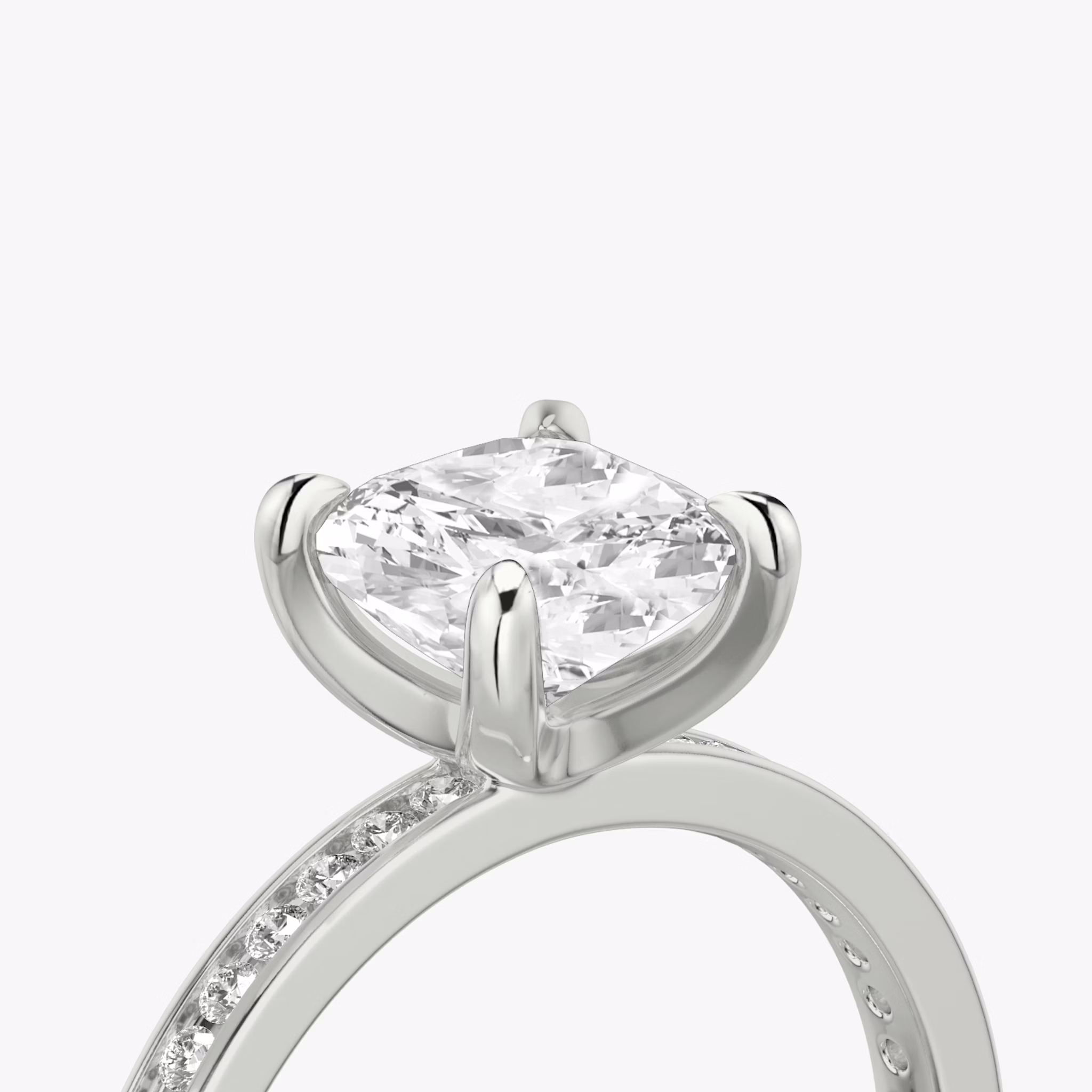 The Devotion | Cushion | 18k | White Gold | bandAccent: Pavé | bandStoneShape: Round Brilliant | bandStoneStyle: original | diamondOrientation: vertical | caratWeight: other