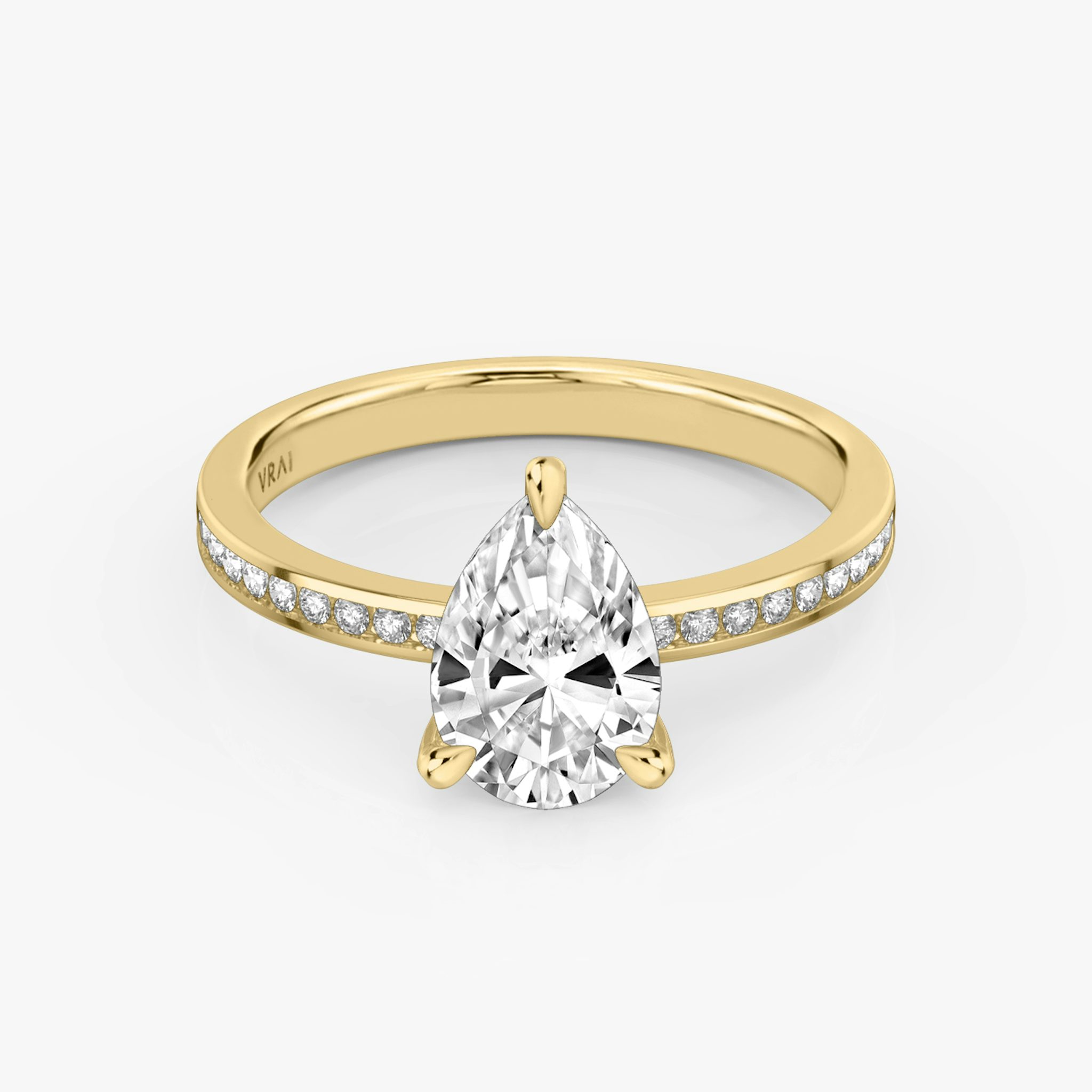Front view of the devotion pear yellow gold engagement ring