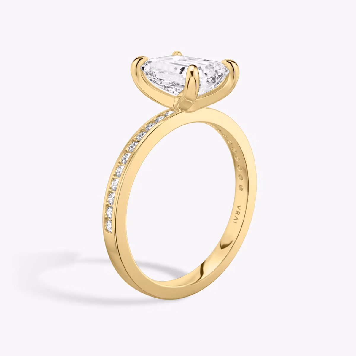 The Devotion | Emerald | 18k | Yellow Gold | bandAccent: Pavé | bandStoneShape: Round Brilliant | bandStoneStyle: original | diamondOrientation: vertical | caratWeight: other