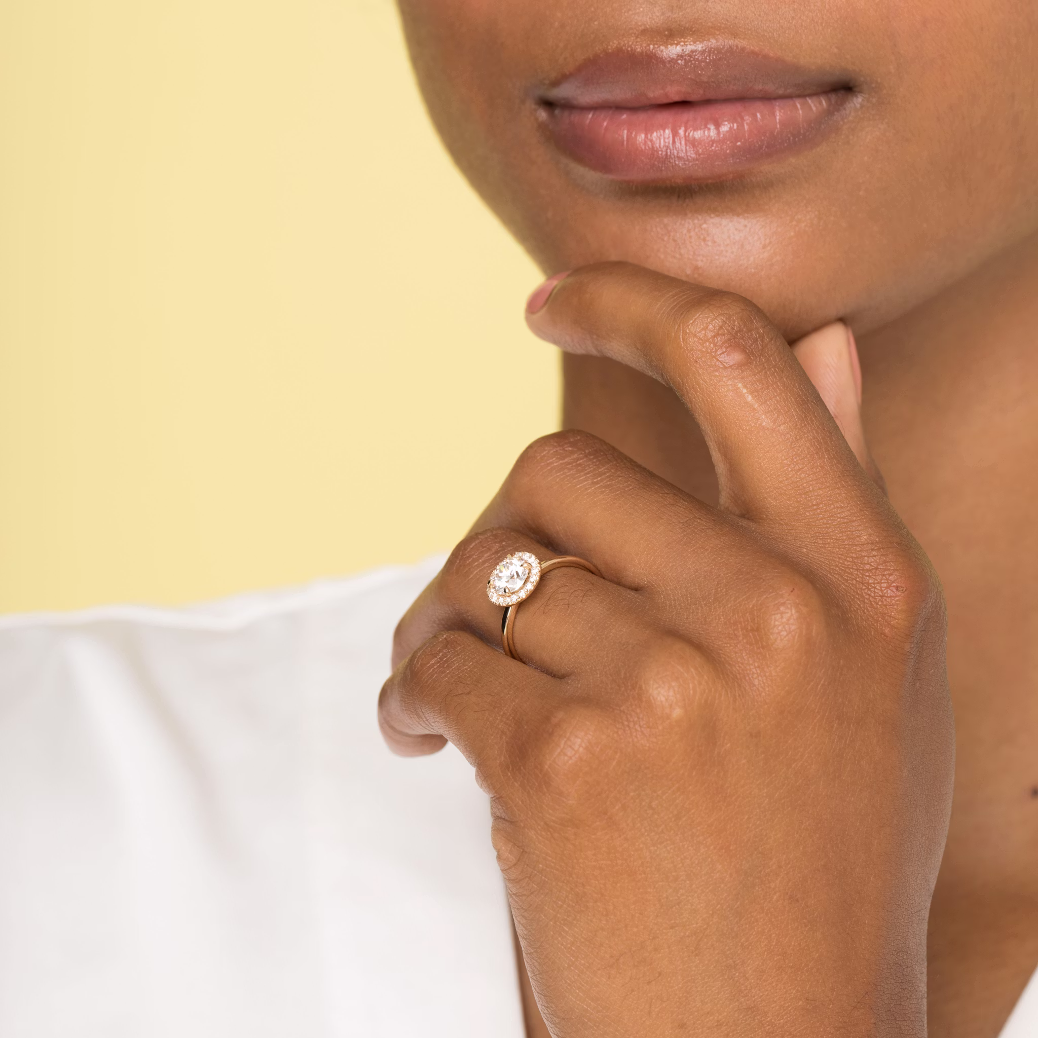 The Halo | Round Brilliant | 18k | White Gold | bandAccent: Plain | caratWeight: other | haloSize: original | diamondOrientation: vertical