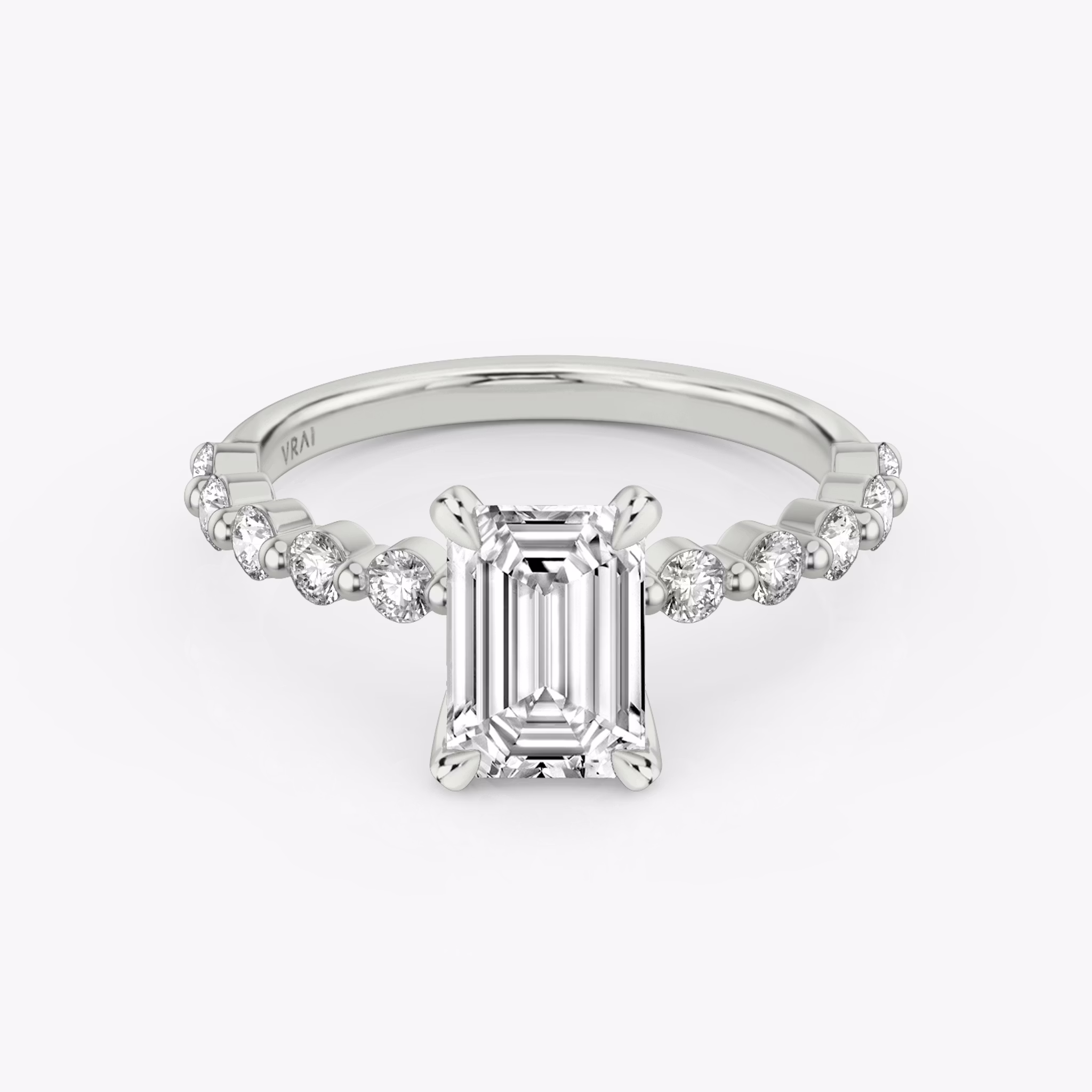 The Single Shared Prong | Emerald | 18k | White Gold | bandAccent: Plain | bandStoneStyle: large | diamondOrientation: vertical | caratWeight: other