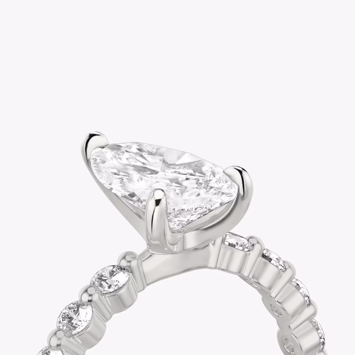 The Single Shared Prong | Pear | Platinum | bandAccent: Plain | bandStoneStyle: large | diamondOrientation: vertical | caratWeight: other