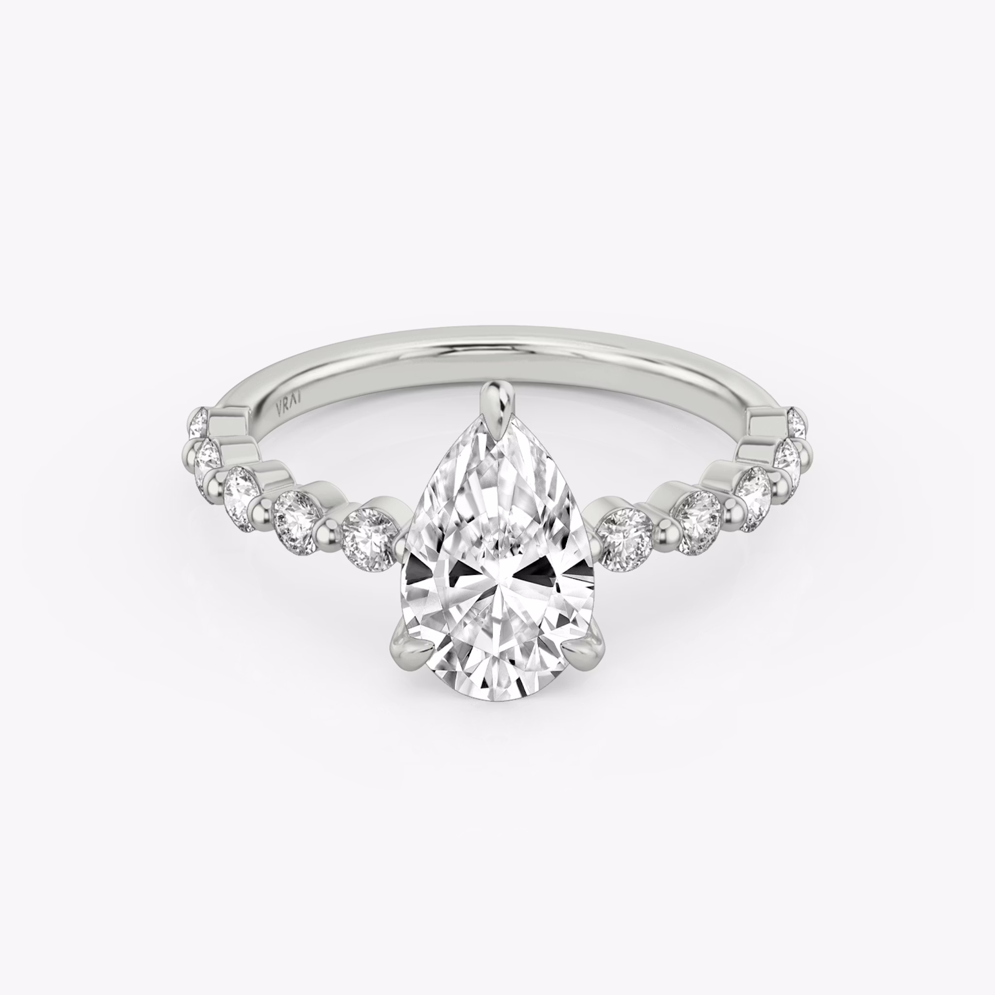 The Single Shared Prong | Pear | 18k | White Gold | bandAccent: Plain | bandStoneStyle: large | diamondOrientation: vertical | caratWeight: other