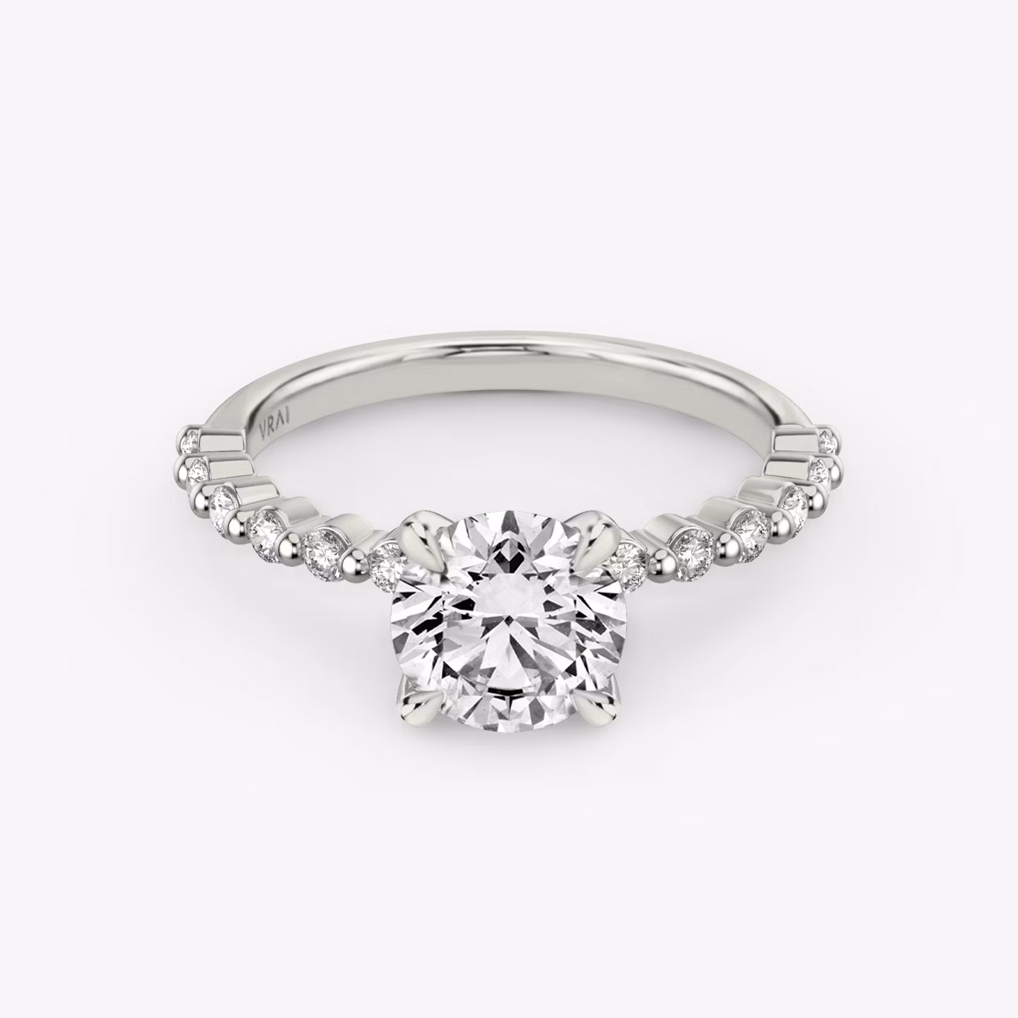 The Single Shared Prong Round Brilliant | Platinum