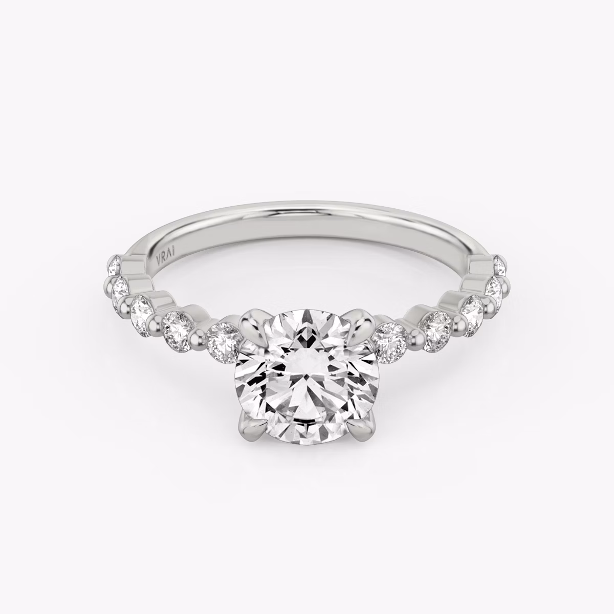 The Single Shared Prong | Round Brilliant | Platinum | bandAccent: Plain | bandStoneStyle: large | caratWeight: other | diamondOrientation: vertical