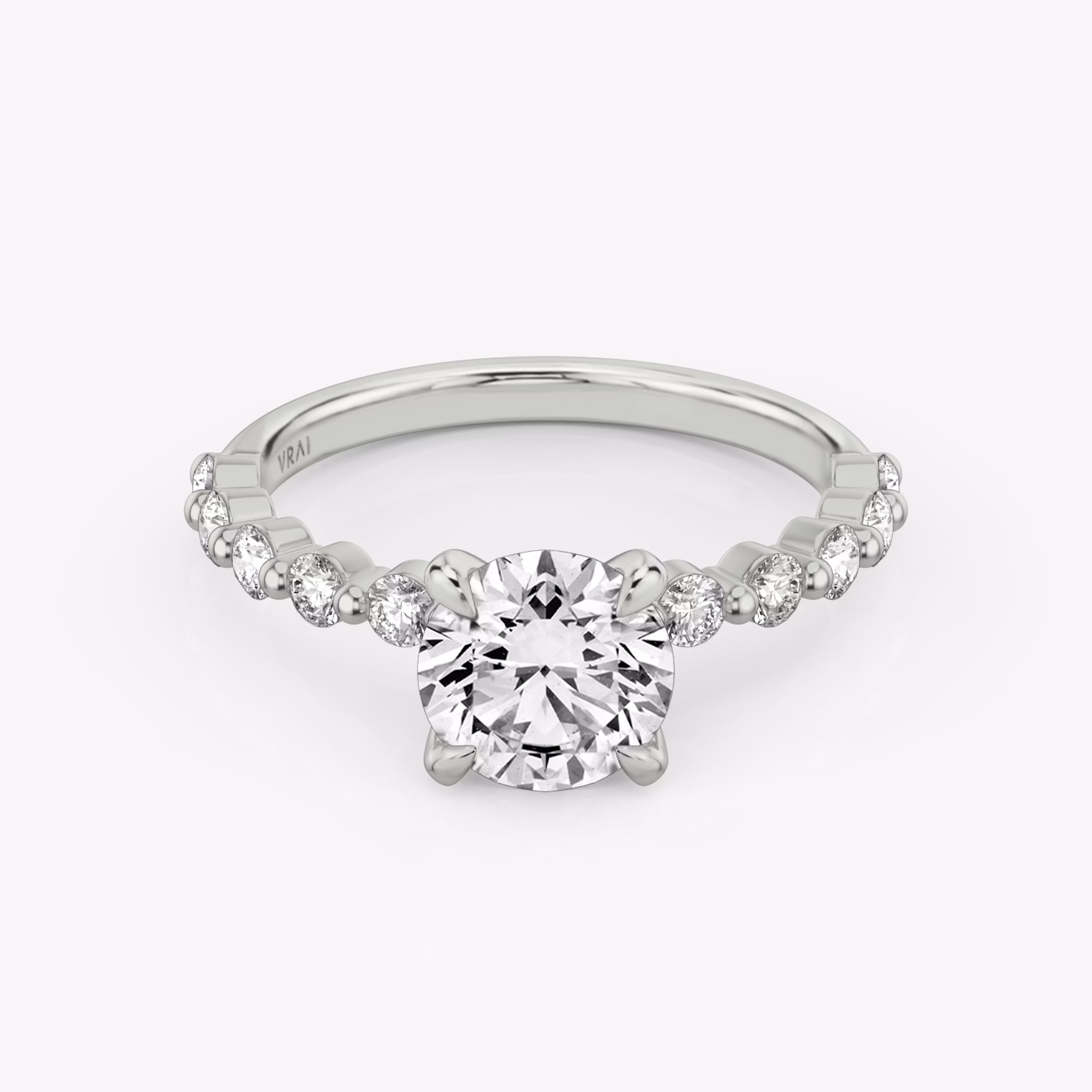 The Single Shared Prong | Round Brilliant | 18k | White Gold | bandAccent: Plain | bandStoneStyle: large | caratWeight: other | diamondOrientation: vertical