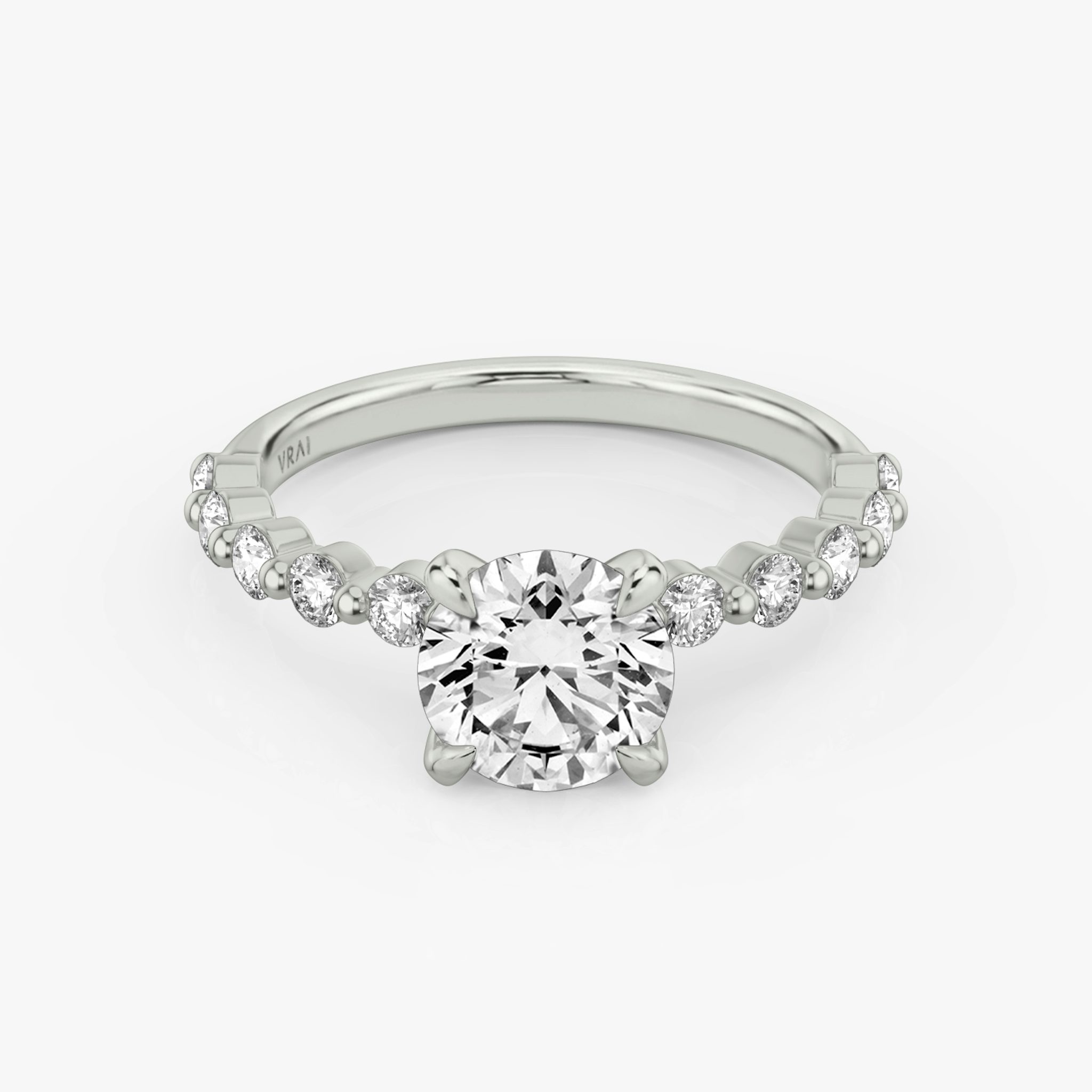 The Single Shared Prong | Round Brilliant | 18k | White Gold | bandAccent: Plain | bandStoneStyle: large | caratWeight: other | diamondOrientation: vertical
