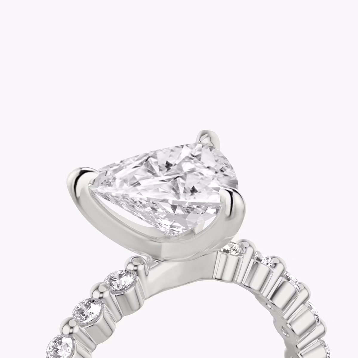 The Single Shared Prong | Trillion | Platinum | bandAccent: Plain | bandStoneStyle: original | diamondOrientation: vertical | caratWeight: other