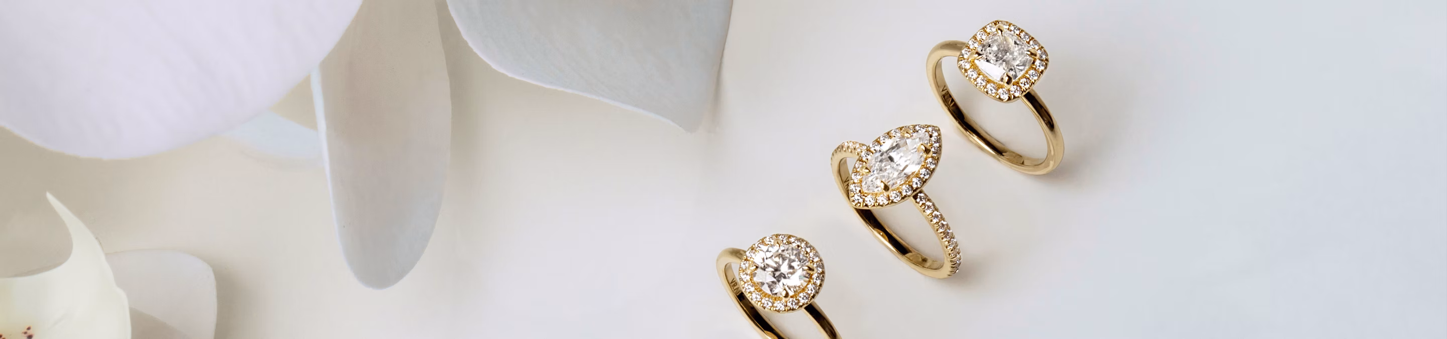 cushion cut halo engagement rings