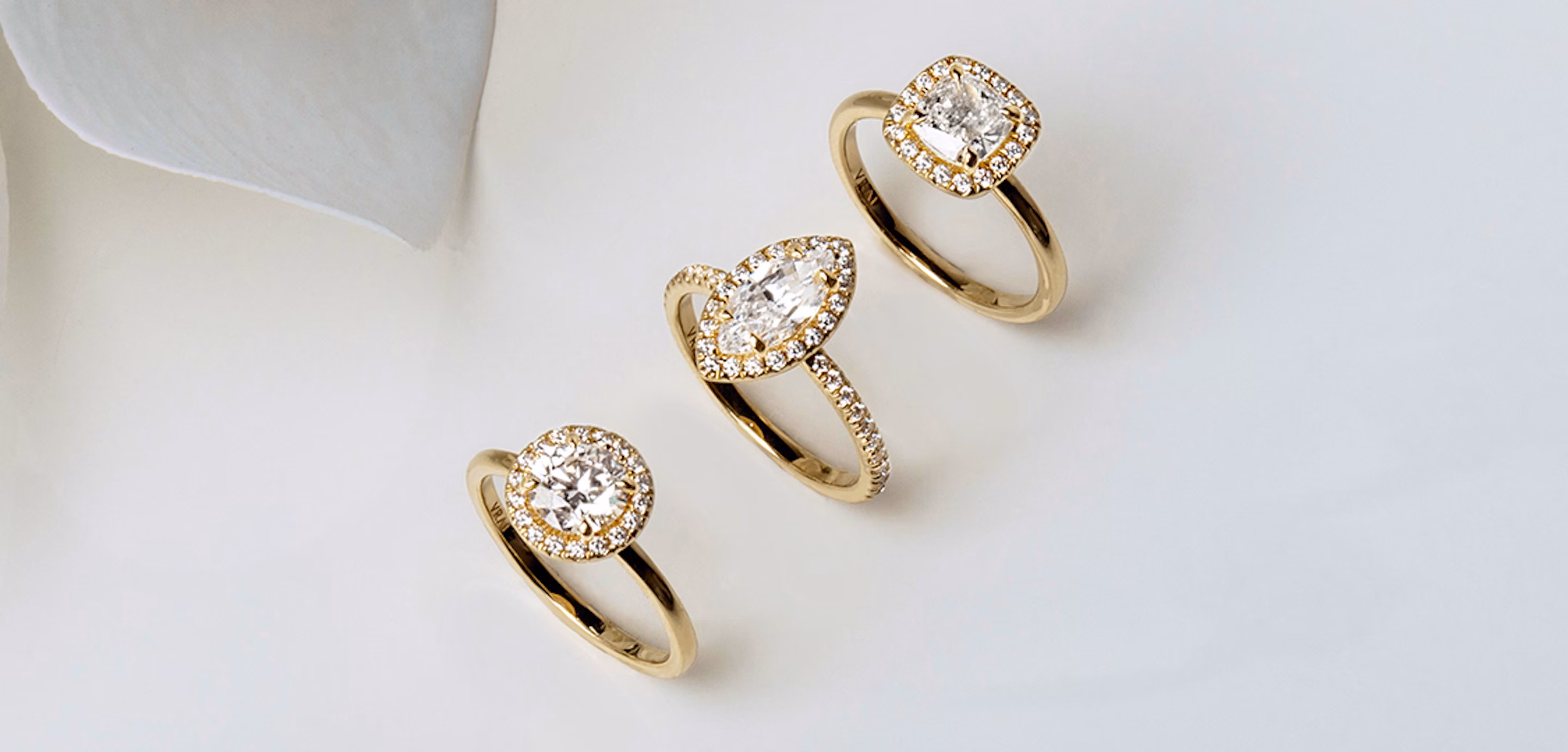 cushion cut halo engagement rings