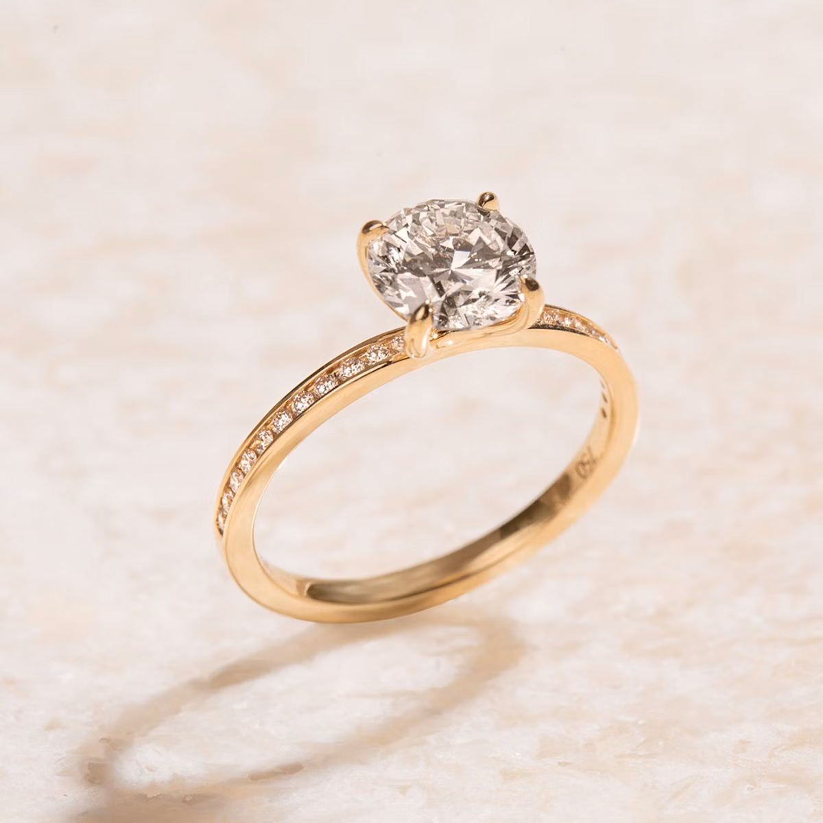 The Devotion | Round Brilliant | 18k | Yellow Gold | bandAccent: Pavé | bandStoneShape: Round Brilliant | bandStoneStyle: large | caratWeight: other | diamondOrientation: vertical