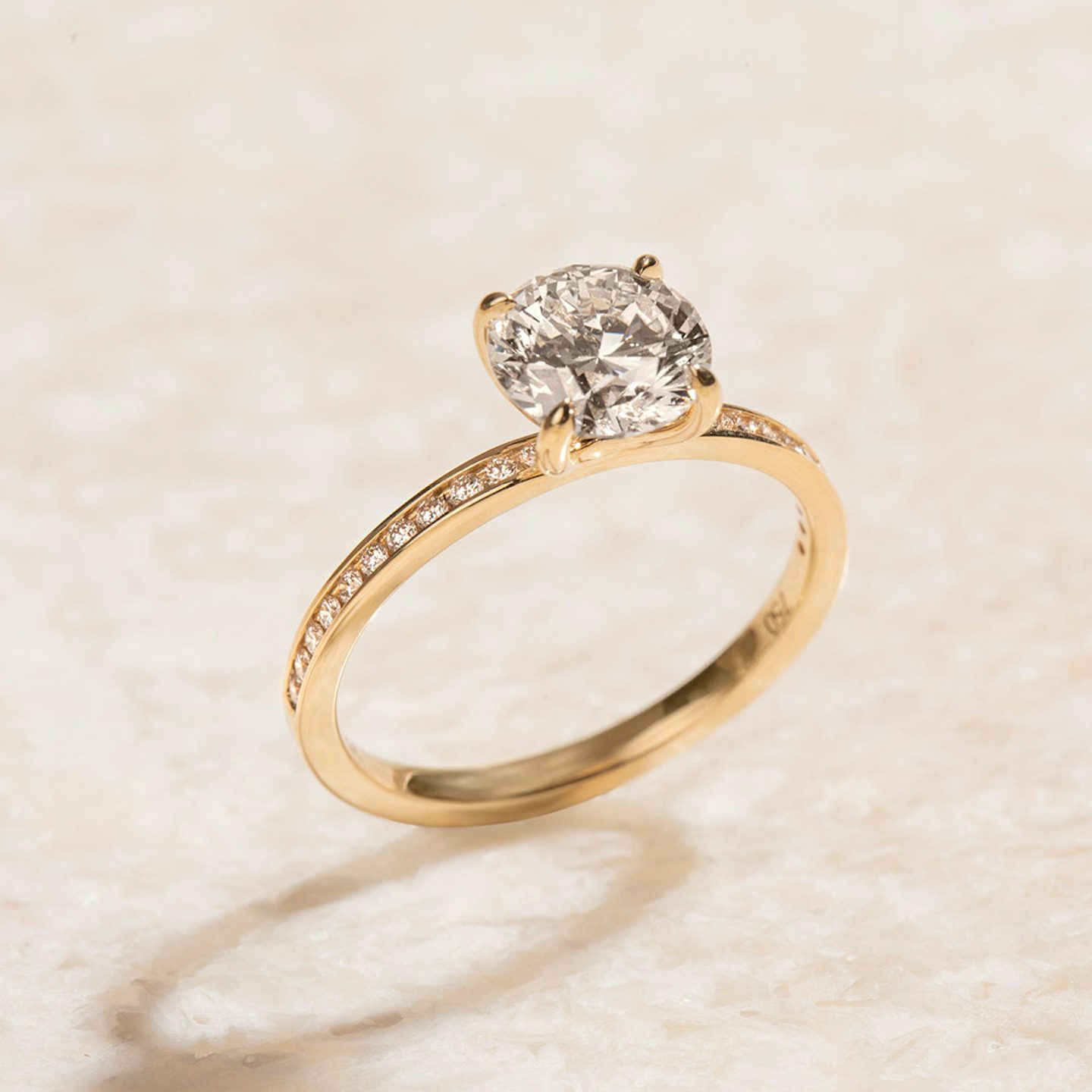 The Devotion | Round Brilliant | 18k | Yellow Gold | bandAccent: Pavé | bandStoneShape: Round Brilliant | bandStoneStyle: large | caratWeight: 1.0ct | diamondOrientation: vertical