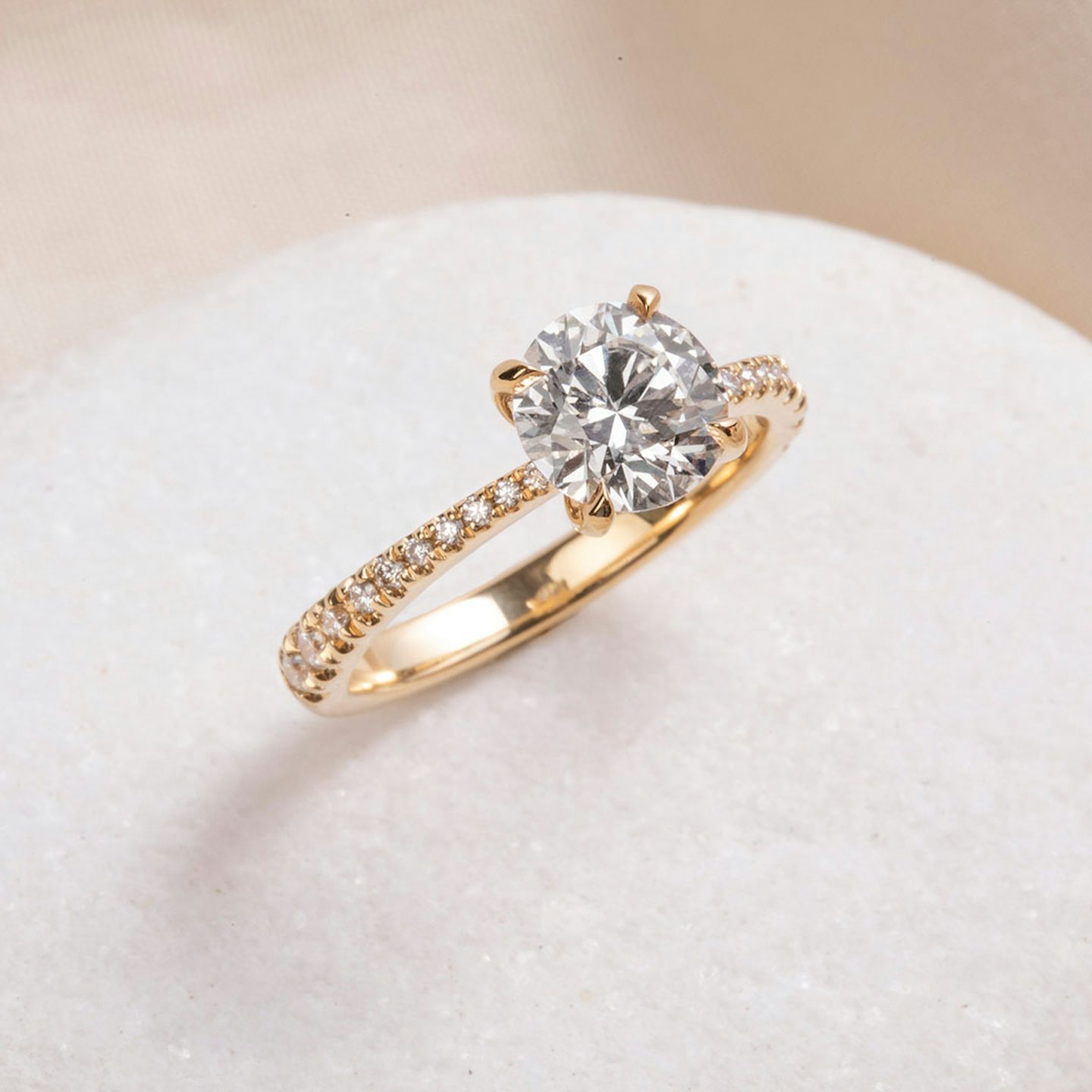 The Tapered Classic | Round Brilliant | 18k | Yellow Gold | bandAccent: Pavé | caratWeight: 1.5ct | diamondOrientation: vertical