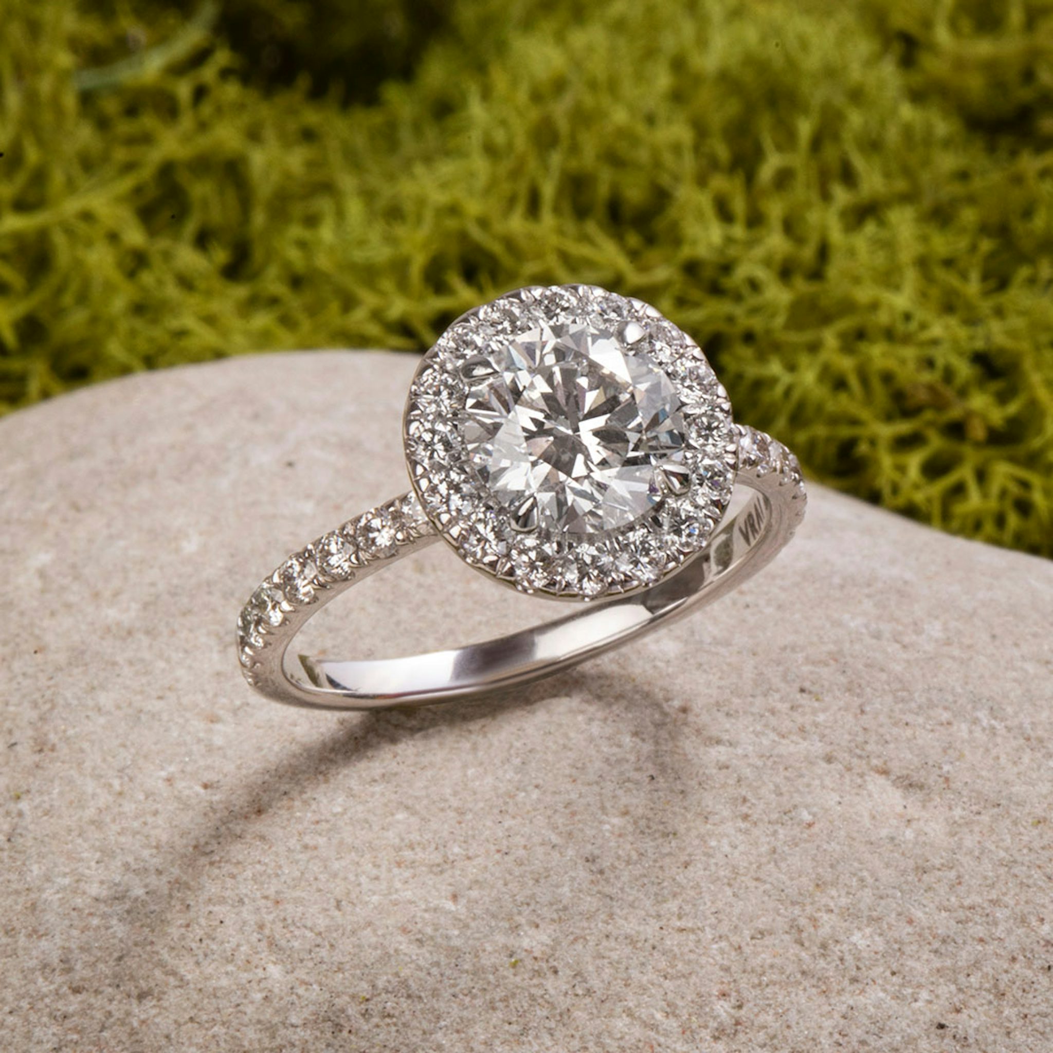 The Halo | Round Brilliant | Platinum | bandAccent: Pavé | caratWeight: 1.5ct | haloSize: large | diamondOrientation: vertical