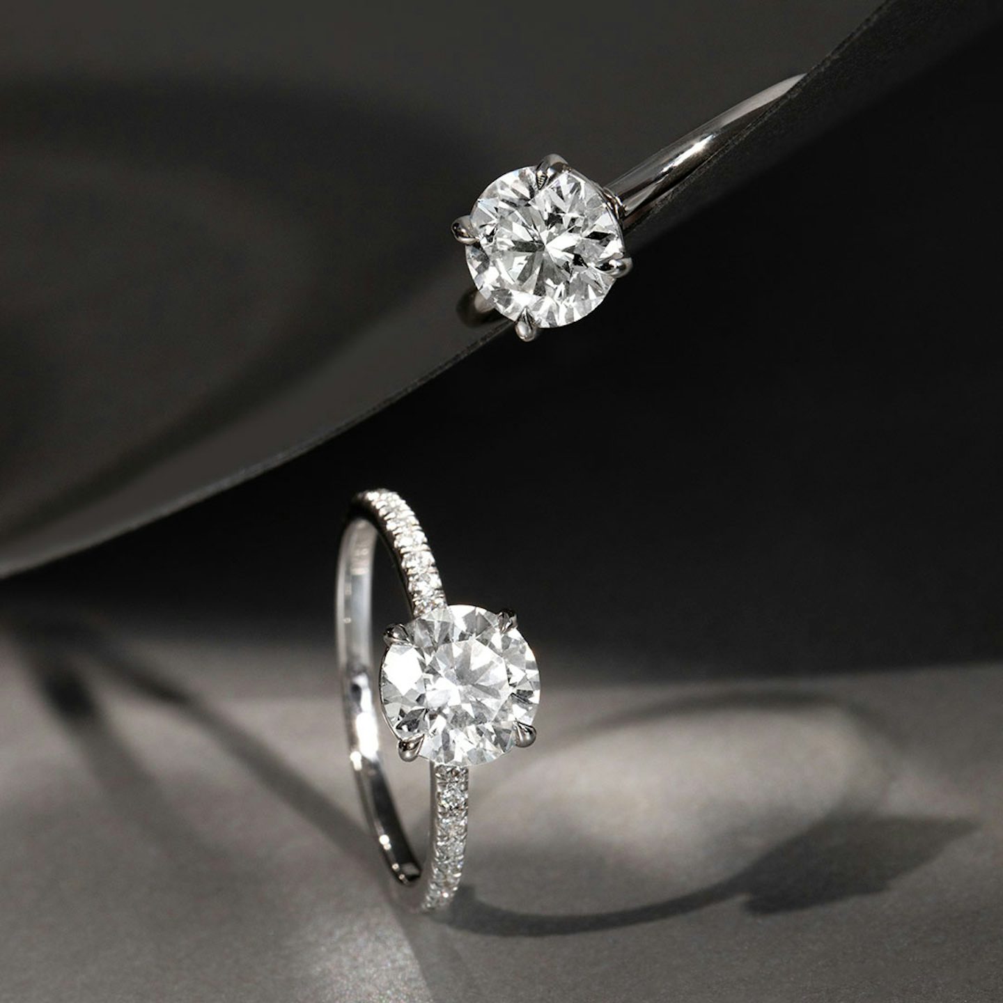 The Classic | Round Brilliant | Platinum | bandAccent: Pavé | bandWidth: standard | caratWeight: 1.5ct | diamondOrientation: vertical