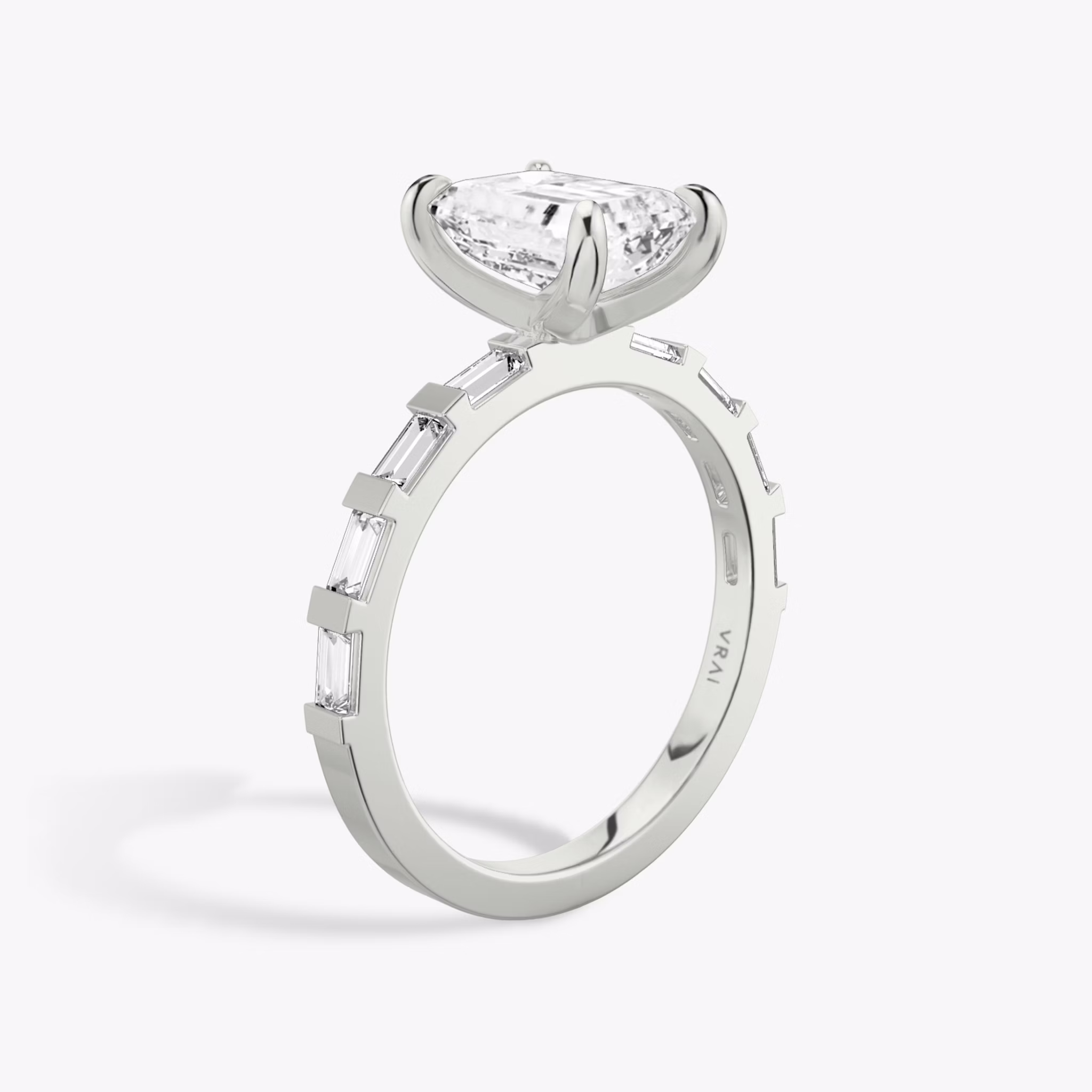 The Baguette Bar | Emerald | Platinum | bandAccent: Pavé | diamondOrientation: vertical | caratWeight: other