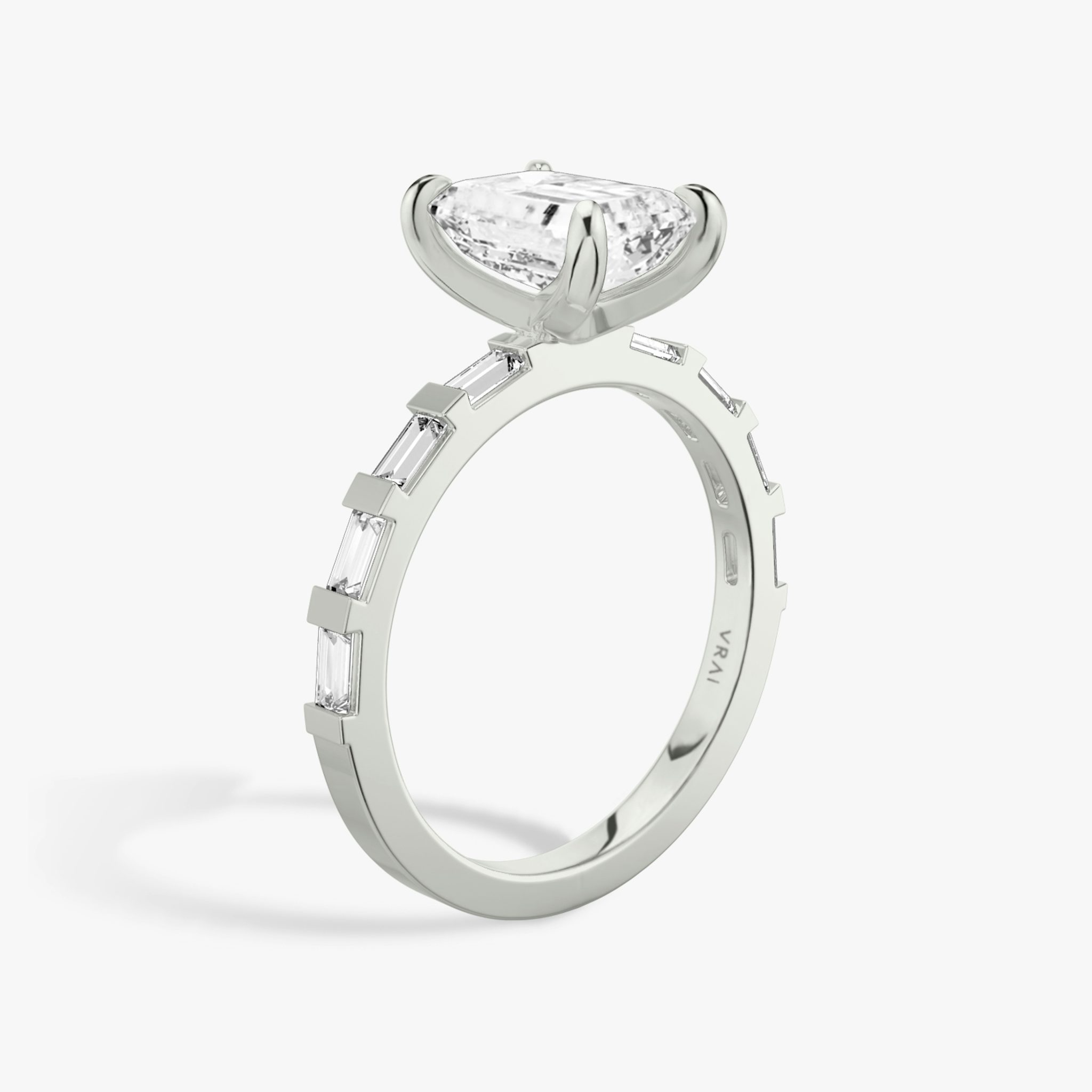 The Baguette Bar | Emerald | Platinum | bandAccent: Pavé | diamondOrientation: vertical | caratWeight: other