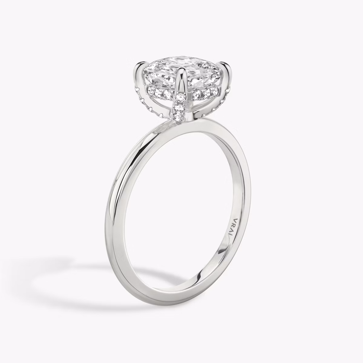 The Classic Hidden Halo | Cushion | Platinum | bandAccent: Plain | bandWidth: standard | prongStyle: Pavé | diamondOrientation: vertical | caratWeight: other