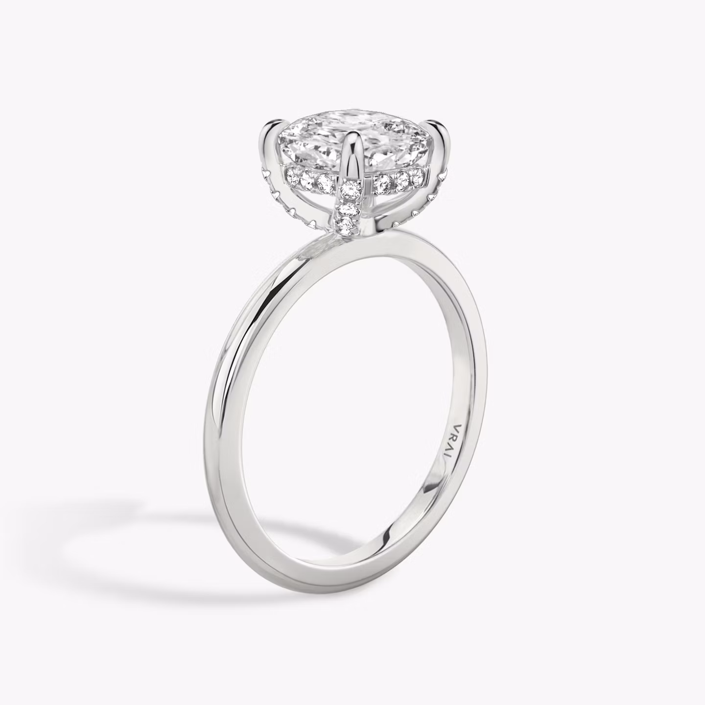 The Classic Hidden Halo | Cushion | Platinum | bandAccent: Plain | bandWidth: standard | prongStyle: Pavé | diamondOrientation: vertical | caratWeight: other