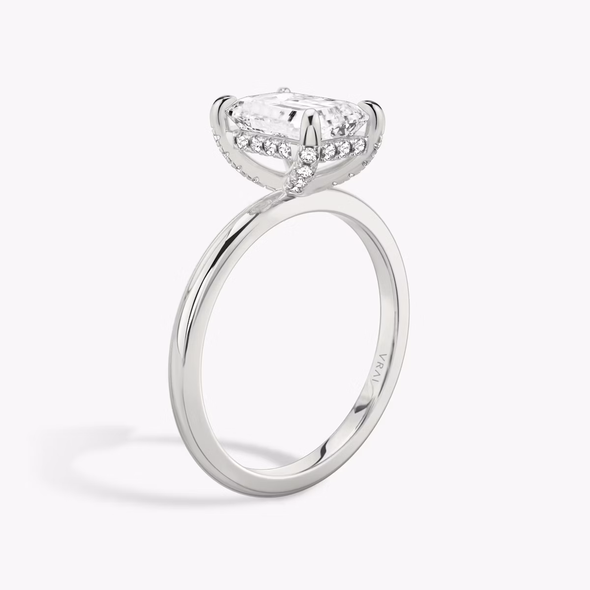 The Classic Hidden Halo | Emerald | 18k | White Gold | bandAccent: Plain | bandWidth: standard | prongStyle: Pavé | diamondOrientation: vertical | caratWeight: other