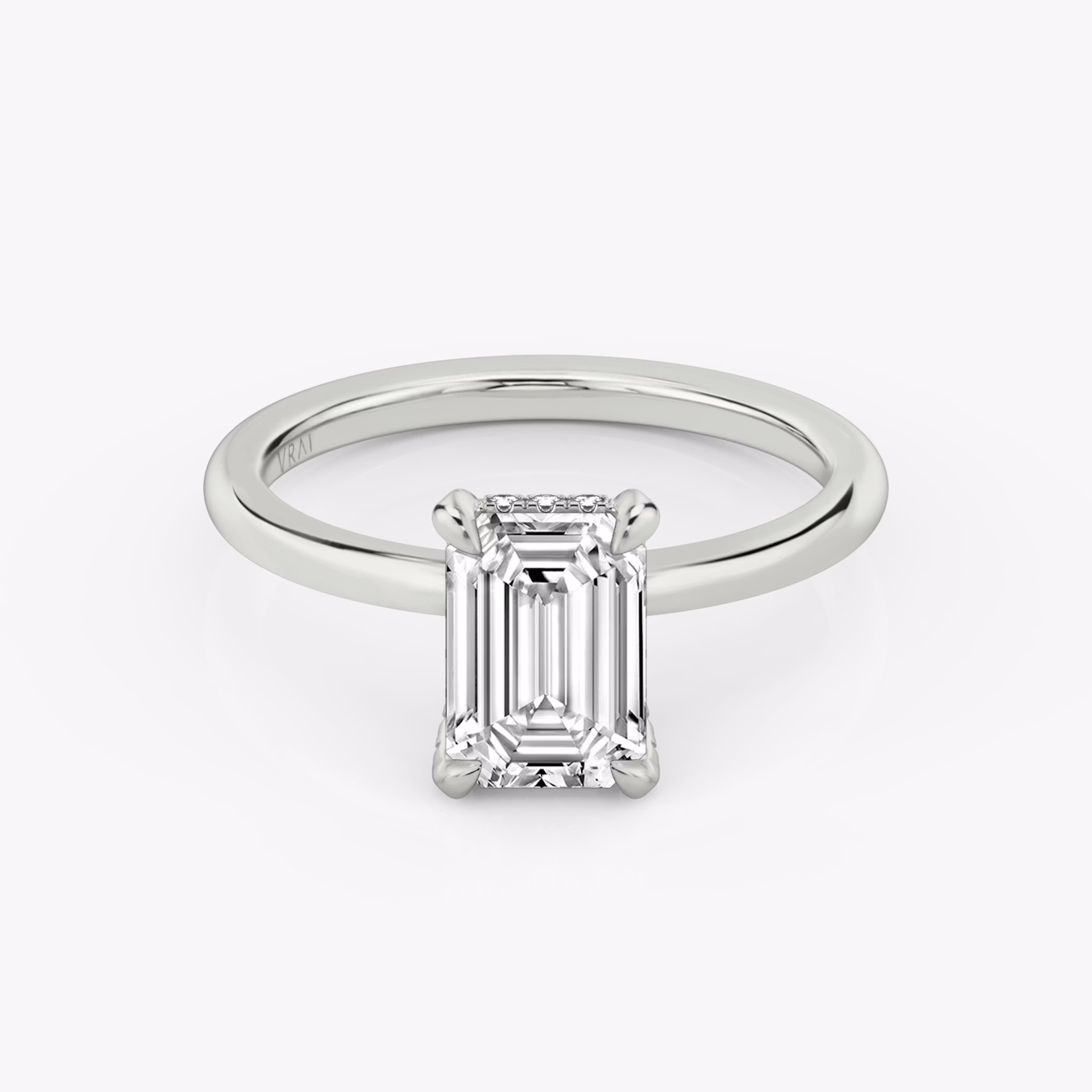 The Classic Hidden Halo | Emerald | 18k | White Gold | bandAccent: Plain | bandWidth: standard | prongStyle: Pavé | diamondOrientation: vertical | caratWeight: other