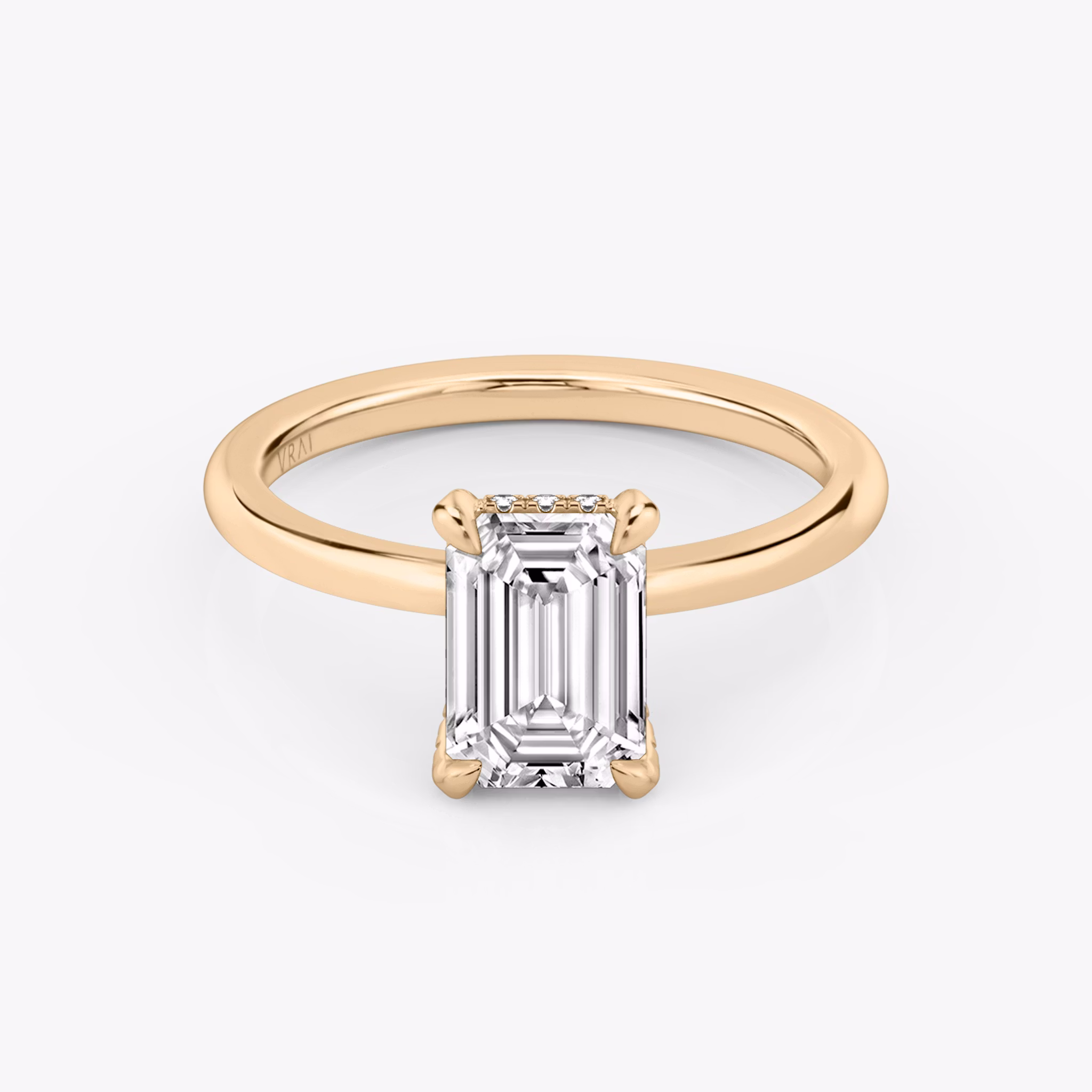 The Classic Hidden Halo | Emerald | 14k | Rose Gold | bandAccent: Plain | bandWidth: standard | prongStyle: Pavé | diamondOrientation: vertical | caratWeight: other