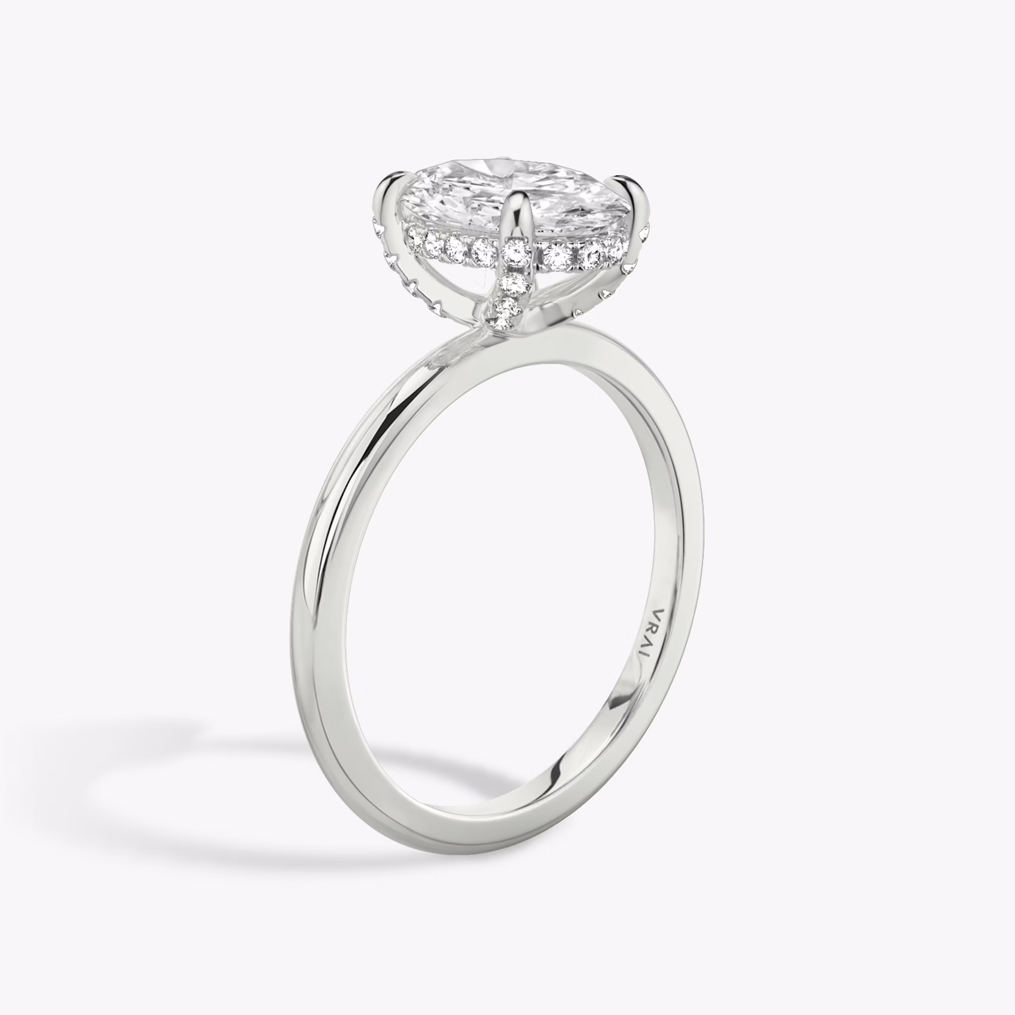 The Classic Hidden Halo | Oval | 18k | White Gold | bandAccent: Plain | bandWidth: standard | prongStyle: Pavé | diamondOrientation: vertical | caratWeight: other