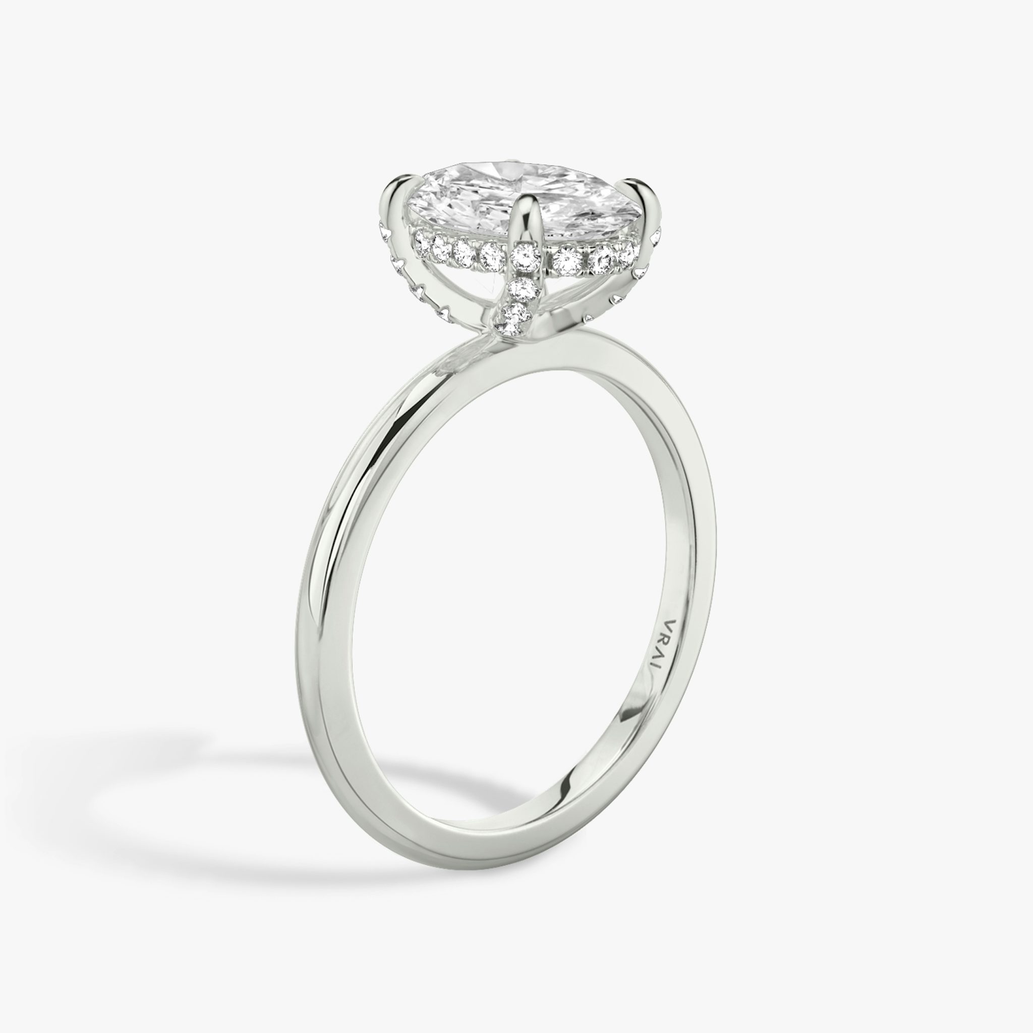 The Classic Hidden Halo | Oval | 18k | White Gold | bandAccent: Plain | bandWidth: standard | prongStyle: Pavé | diamondOrientation: vertical | caratWeight: other