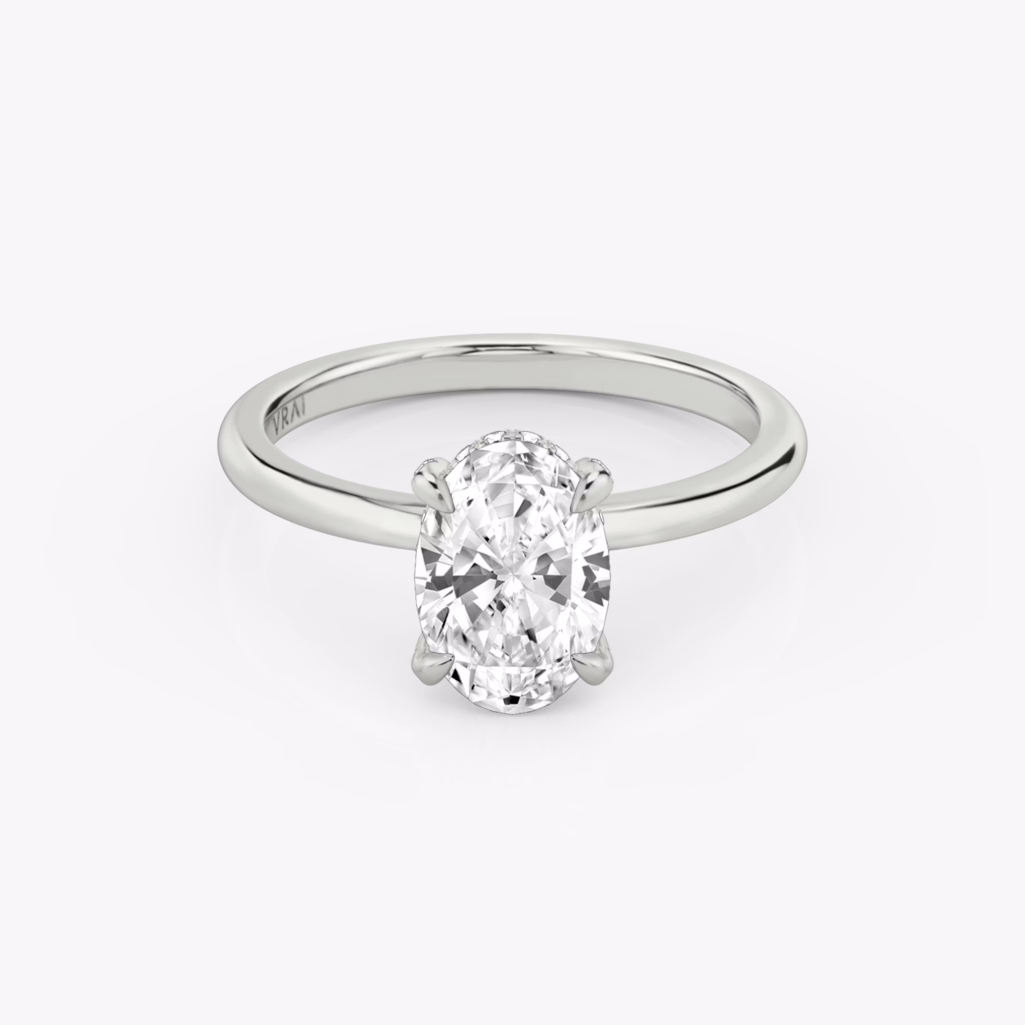 The Classic Hidden Halo | Oval | 18k | White Gold | bandAccent: Plain | bandWidth: standard | prongStyle: Pavé | diamondOrientation: vertical | caratWeight: other