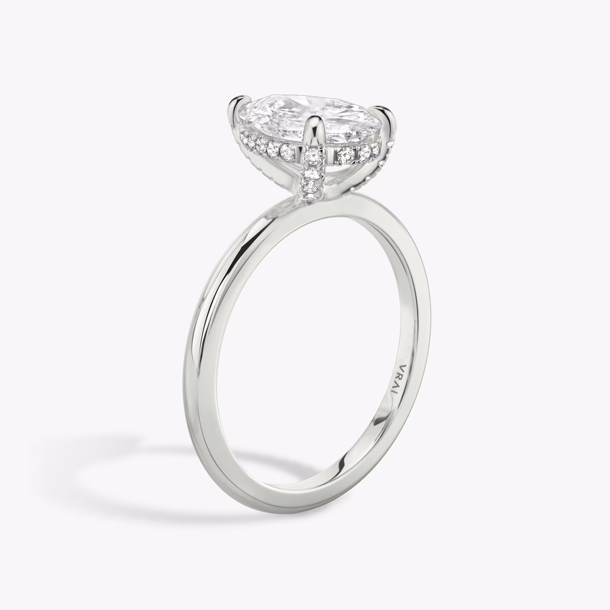 The Classic Hidden Halo | Pear | 18k | White Gold | bandAccent: Plain | bandWidth: standard | prongStyle: Pavé | diamondOrientation: vertical | caratWeight: other
