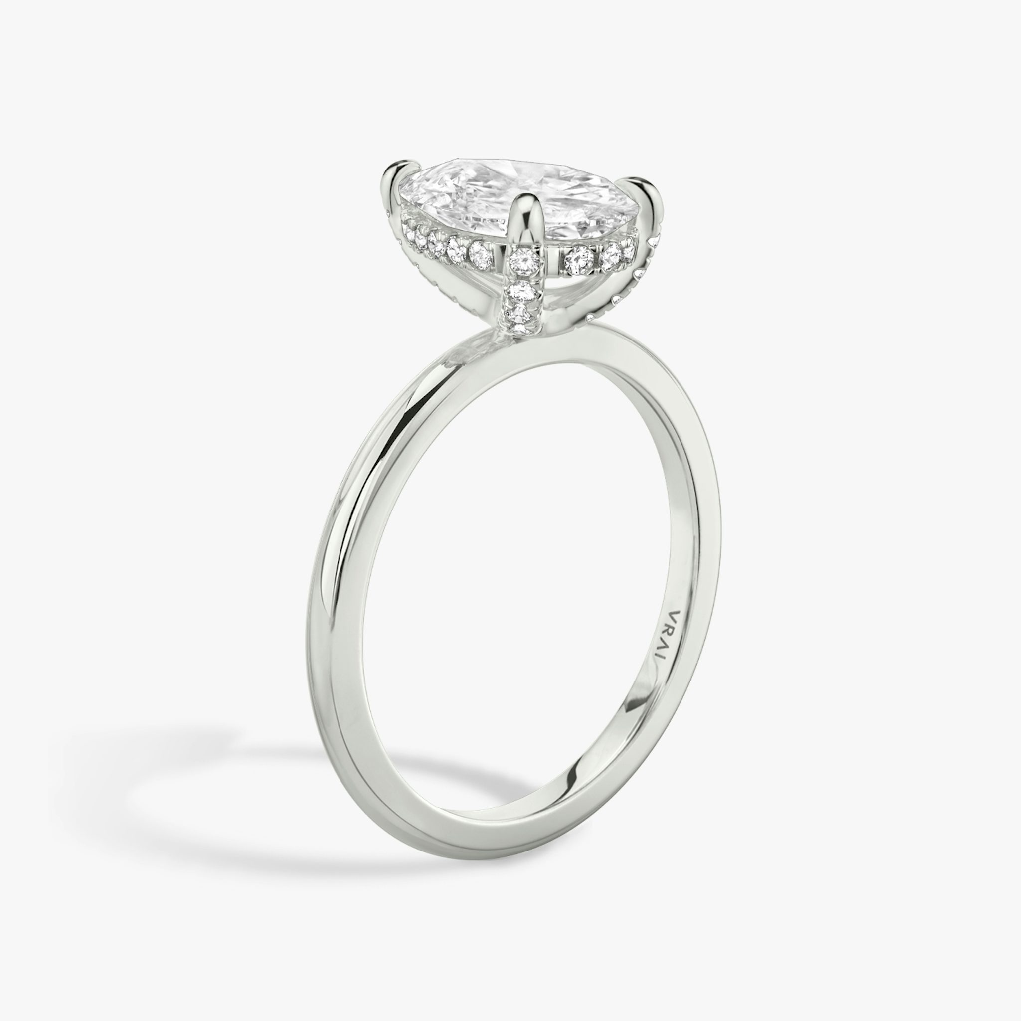 The Classic Hidden Halo | Pear | 18k | White Gold | bandAccent: Plain | bandWidth: standard | prongStyle: Pavé | diamondOrientation: vertical | caratWeight: other