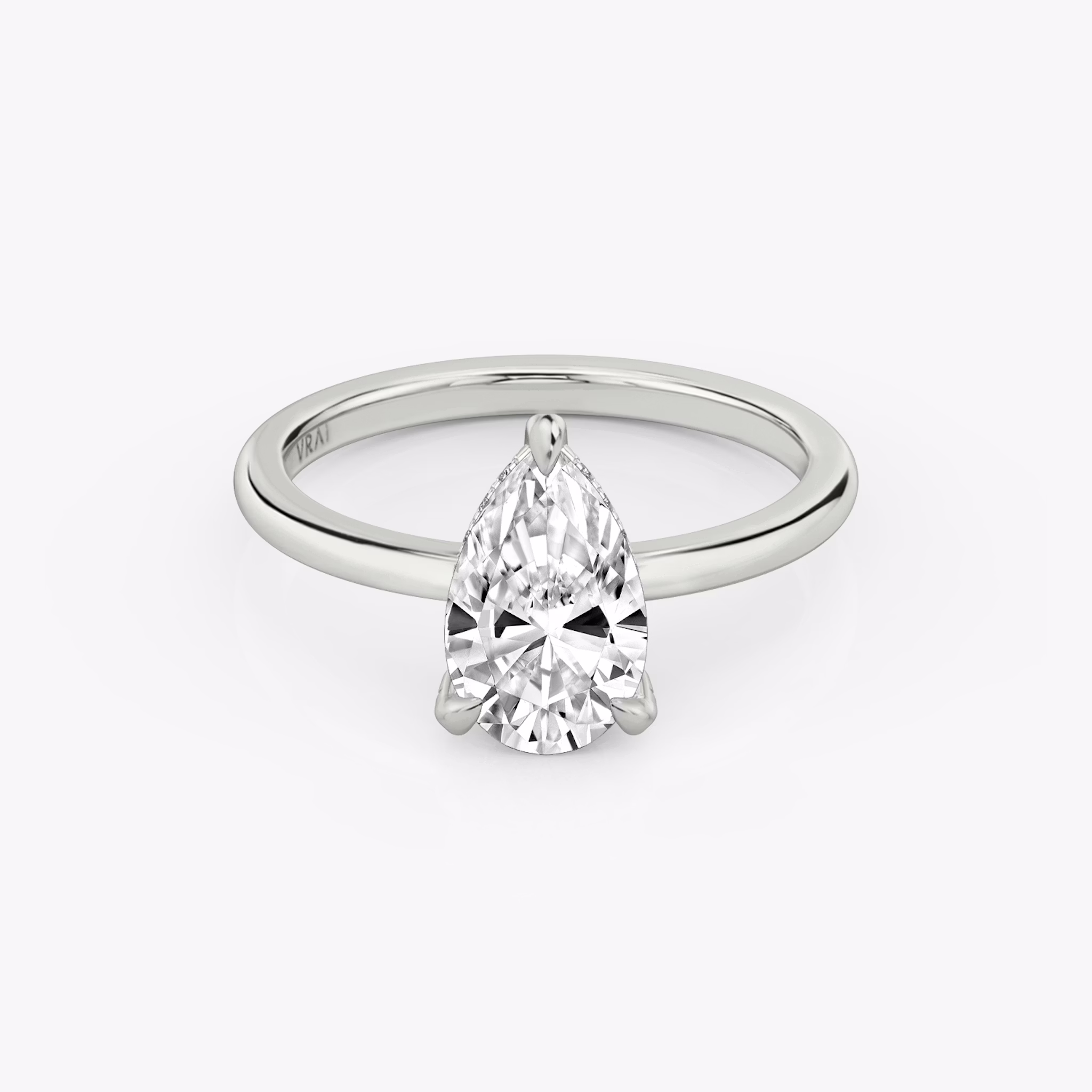 The Classic Hidden Halo | Pear | 18k | White Gold | bandAccent: Plain | bandWidth: standard | prongStyle: Pavé | diamondOrientation: vertical | caratWeight: other