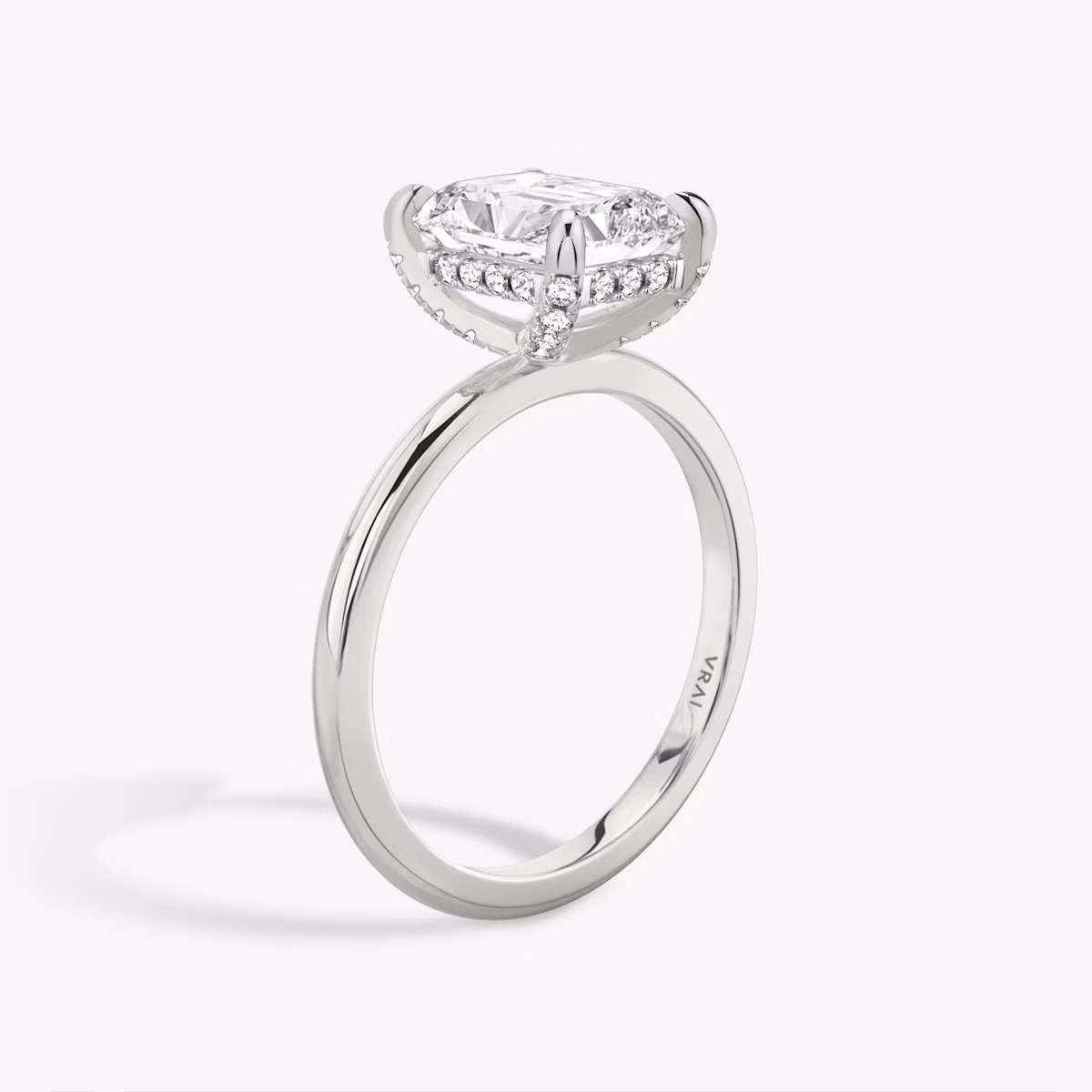 The Classic Hidden Halo | Radiant | 18k | White Gold | bandAccent: Plain | bandWidth: standard | prongStyle: Pavé | diamondOrientation: vertical | caratWeight: other