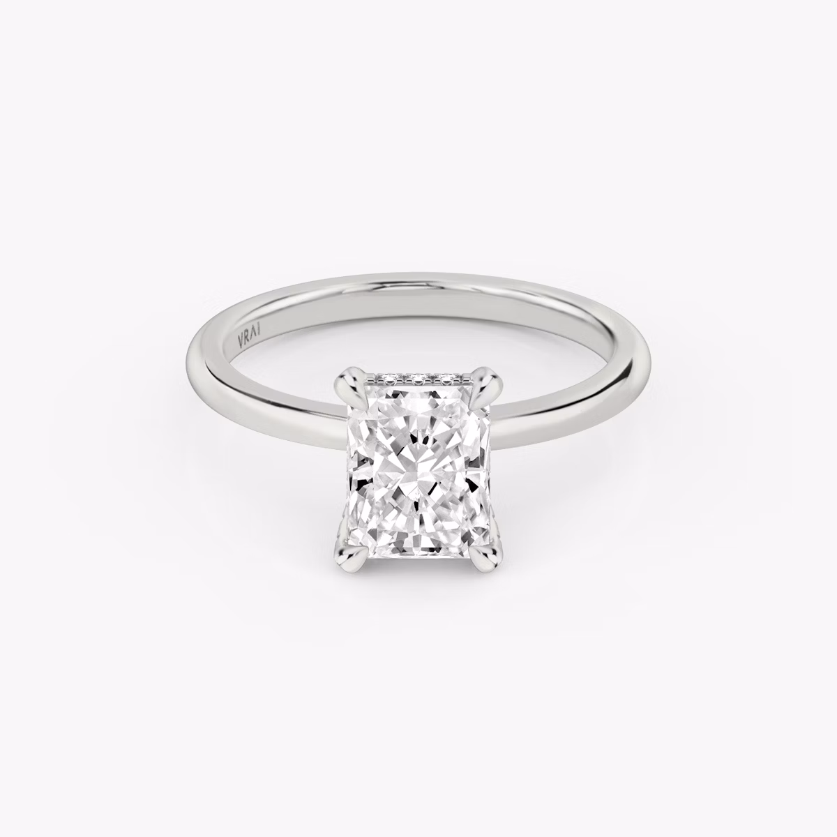 The Classic Hidden Halo | Radiant | 18k | White Gold | bandAccent: Plain | bandWidth: standard | prongStyle: Pavé | diamondOrientation: vertical | caratWeight: other