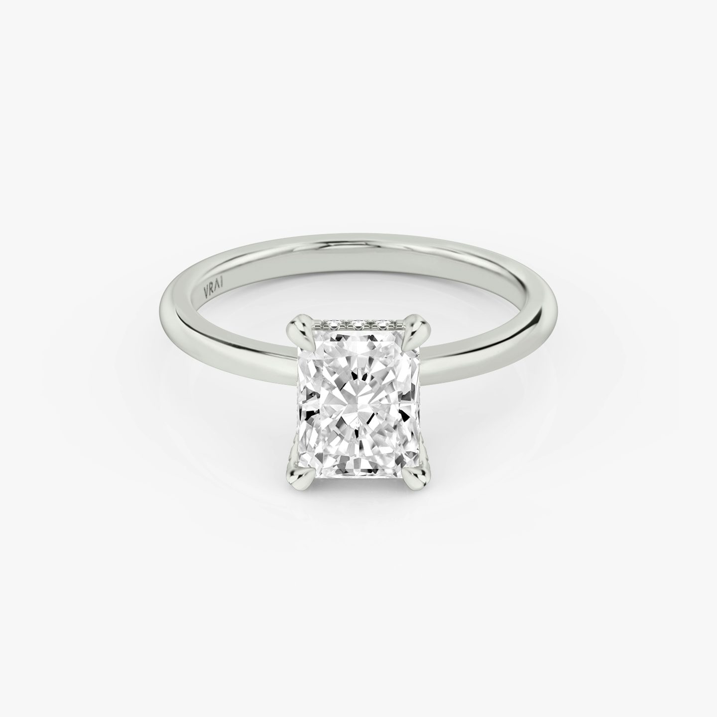 The Classic Hidden Halo | Radiant | Platinum | bandAccent: Plain | bandWidth: standard | prongStyle: Pavé | diamondOrientation: vertical | caratWeight: other